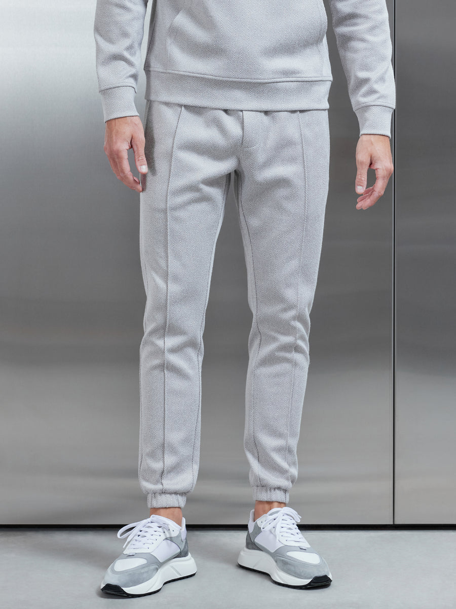 Nike club cuffed joggers best sale in stone