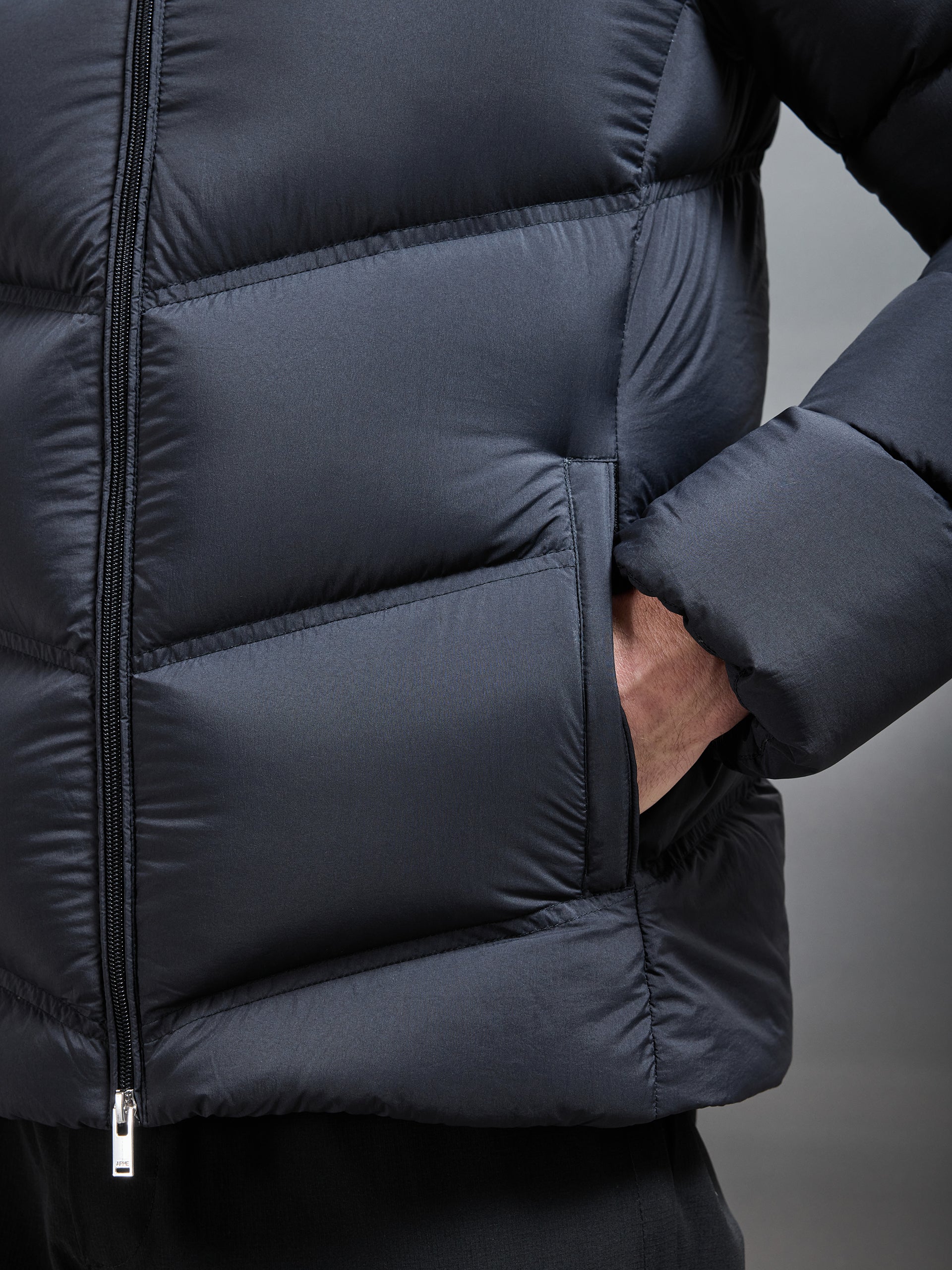 Chevron Down Puffer Jacket in Black