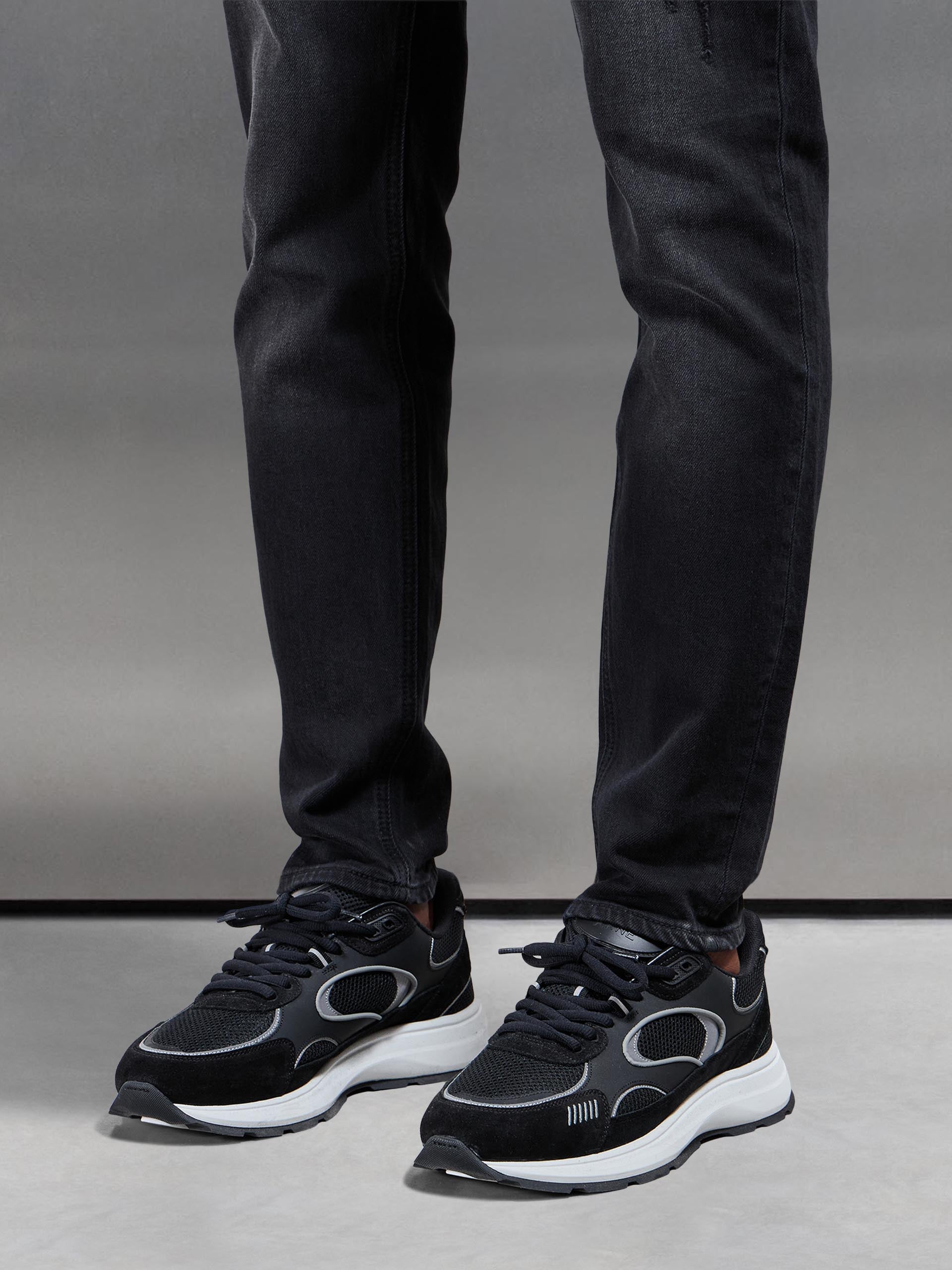 Distressed Denim Jeans in Black Wash