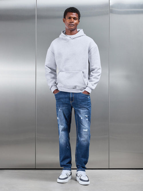 Distressed Straight Leg Denim Jeans in Mid Blue