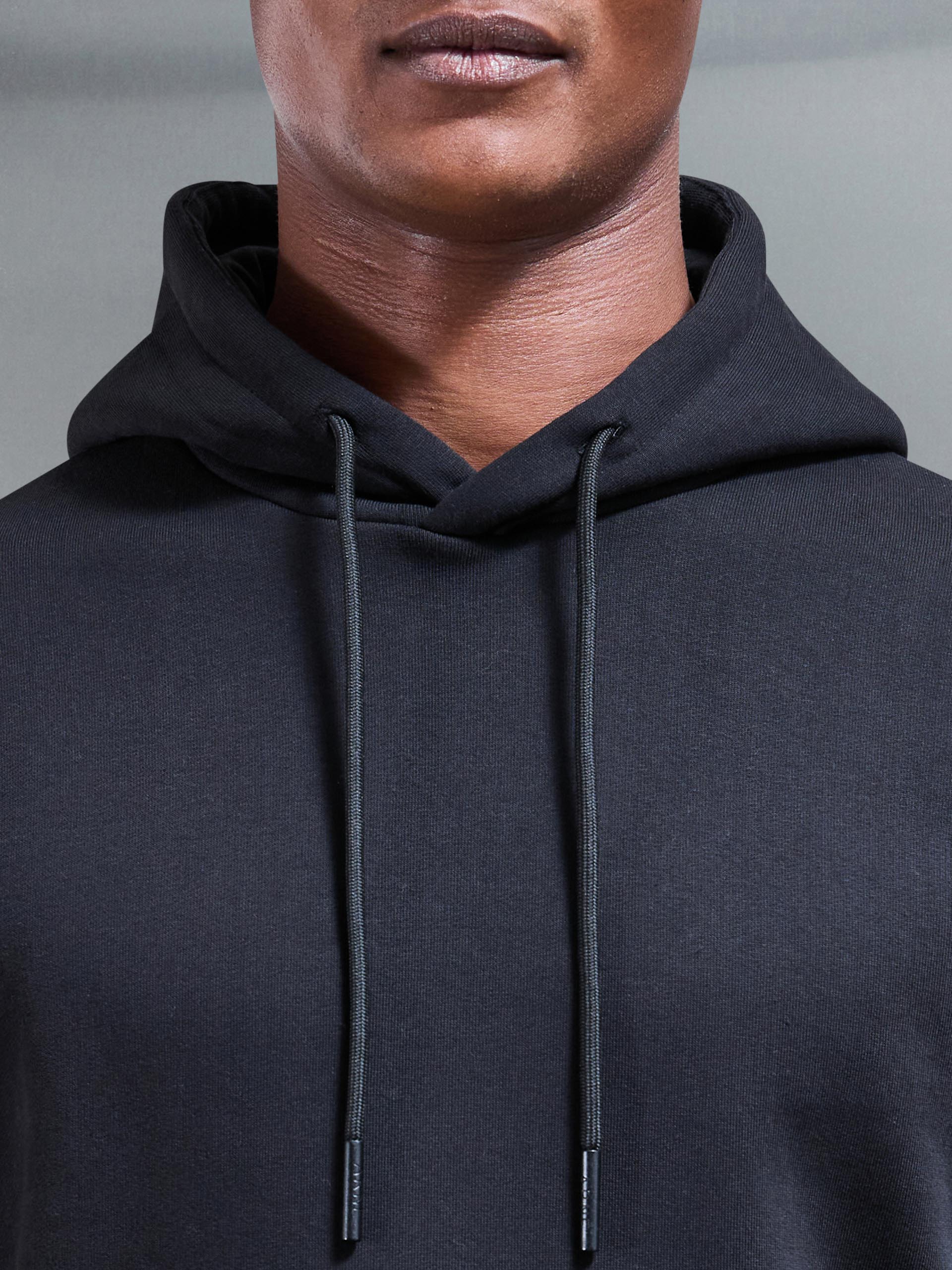 Essential Drawcord Jersey Hoodie in Black