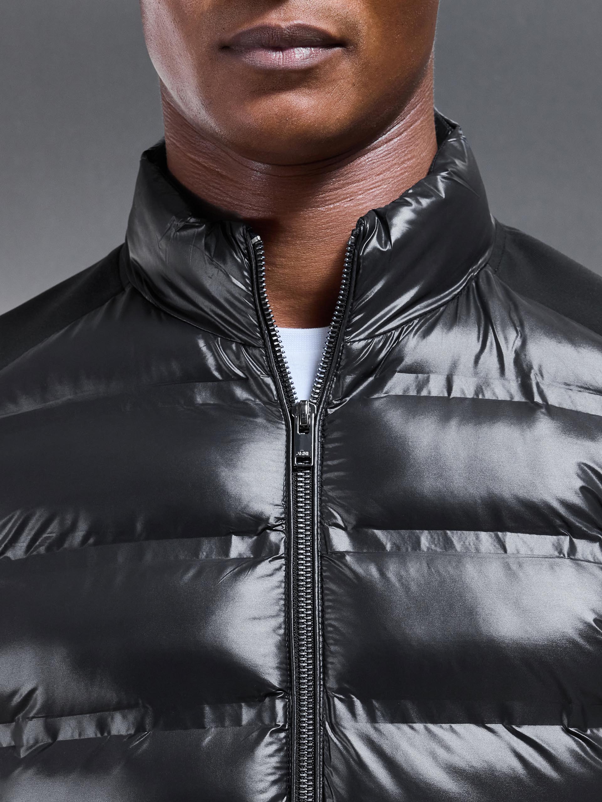 Hybrid Zip Through Puffer Jacket in Black
