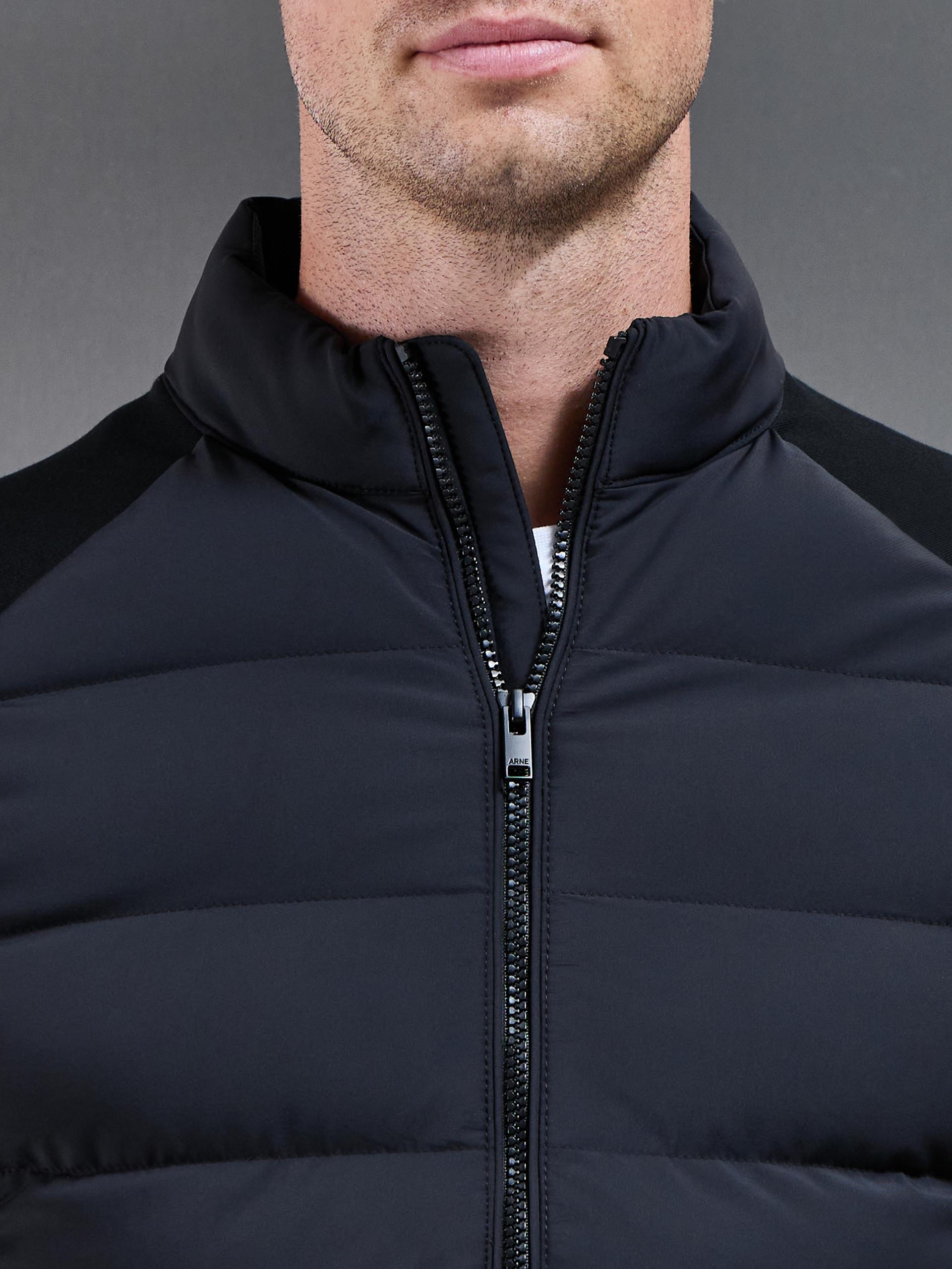 Hybrid Technical Puffer Jacket in Black