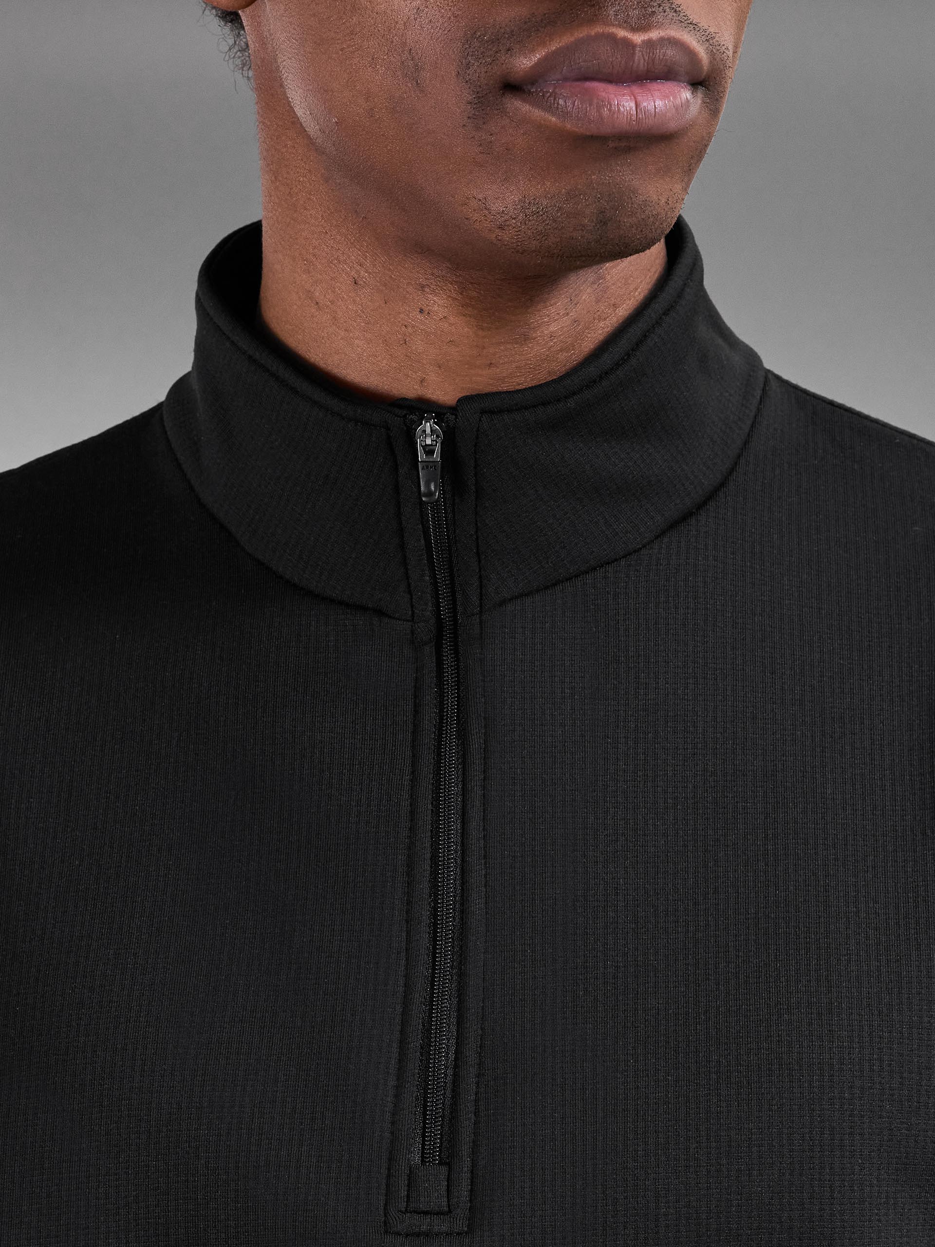 Insulating Golf Mid Layer in Black