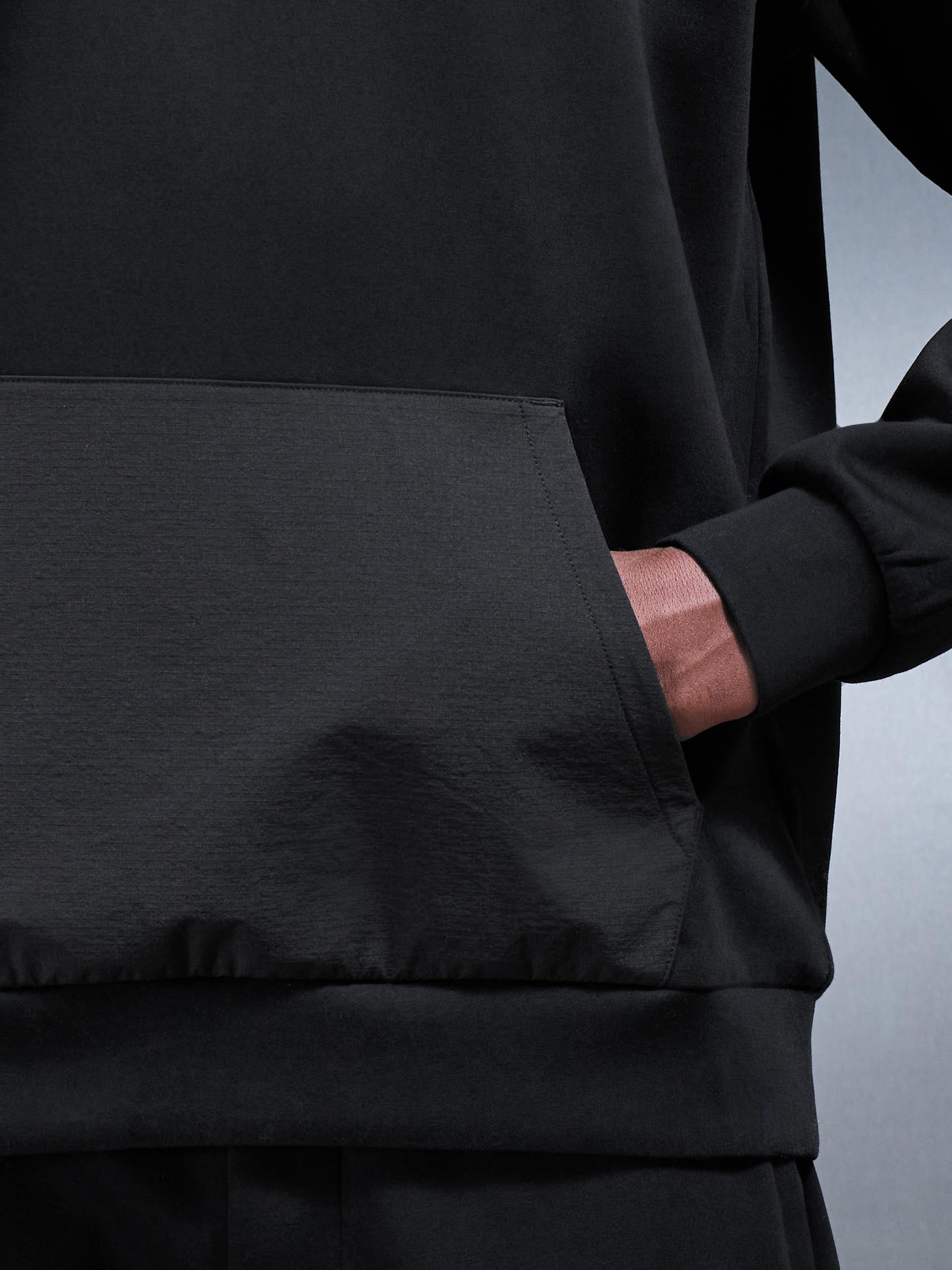 Interlock Jersey Hybrid Relaxed Hoodie in Black