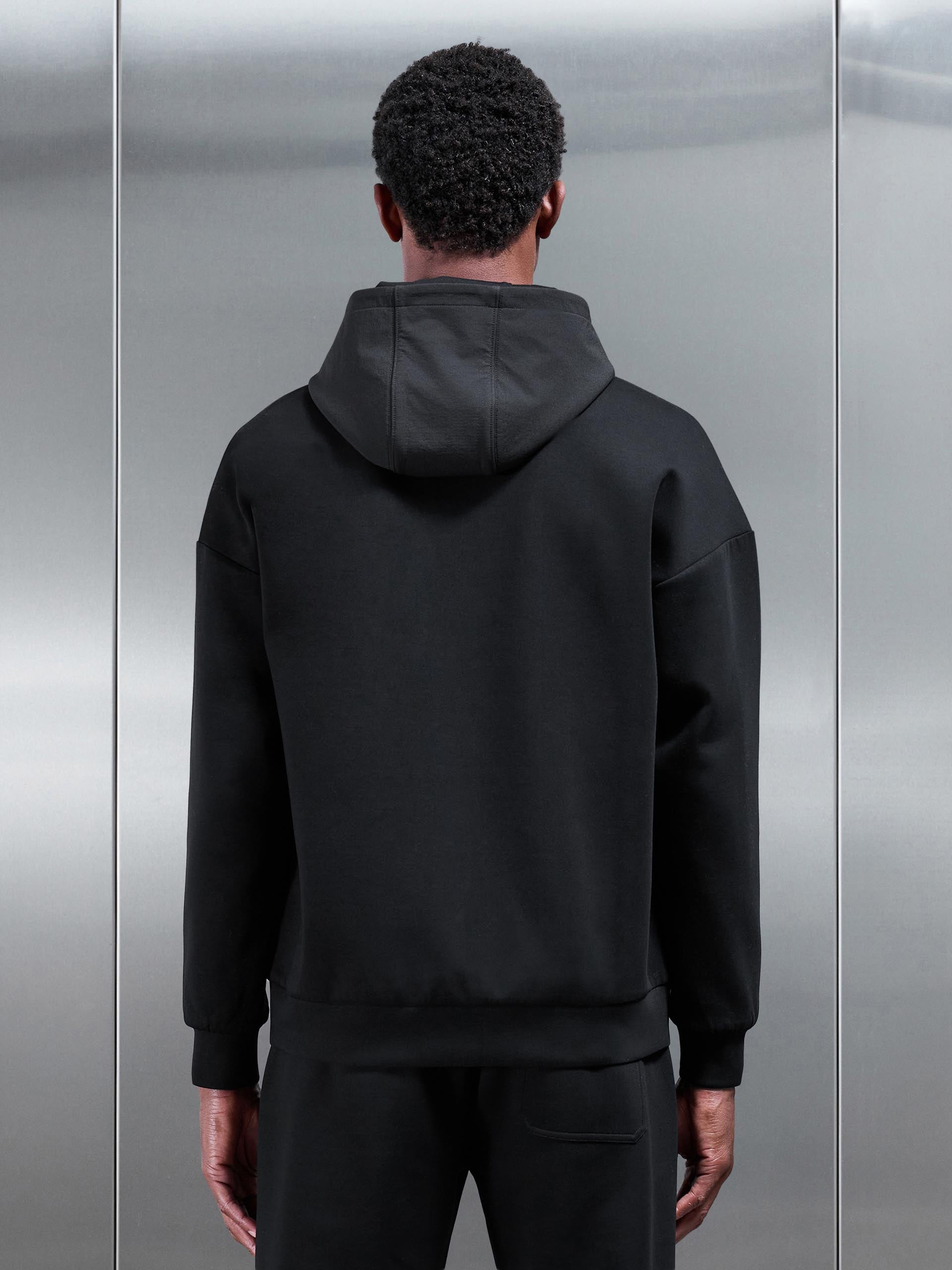 Interlock Jersey Hybrid Relaxed Hoodie in Black