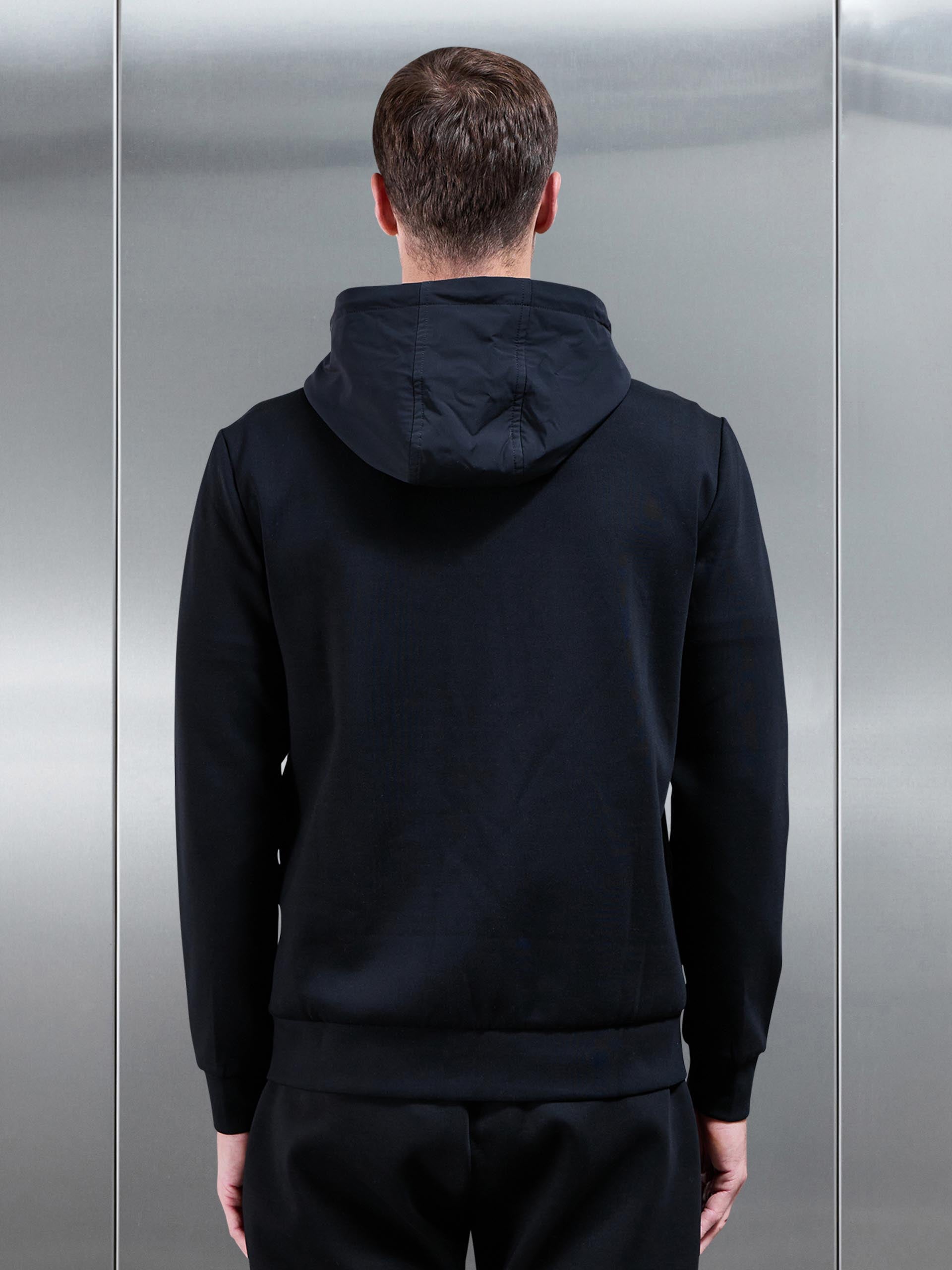 Interlock Jersey Hybrid Technical Windbreaker in Black