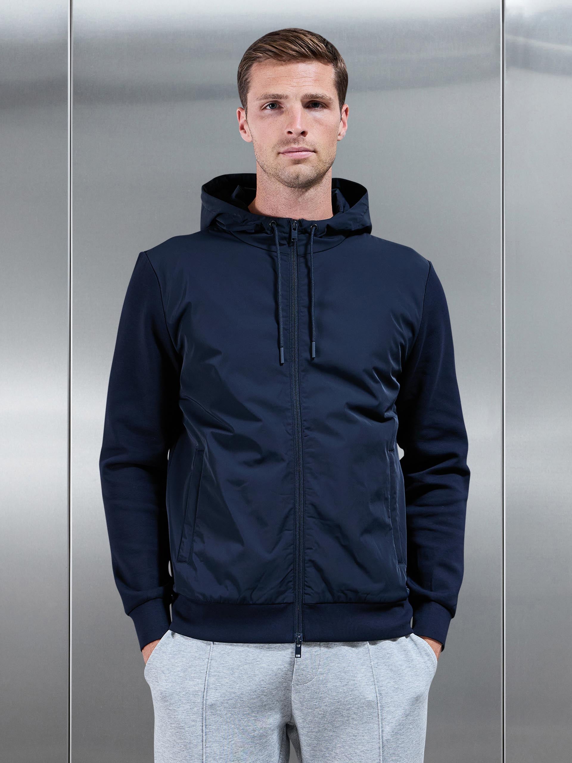 Interlock Jersey Hybrid Technical Windbreaker in Navy