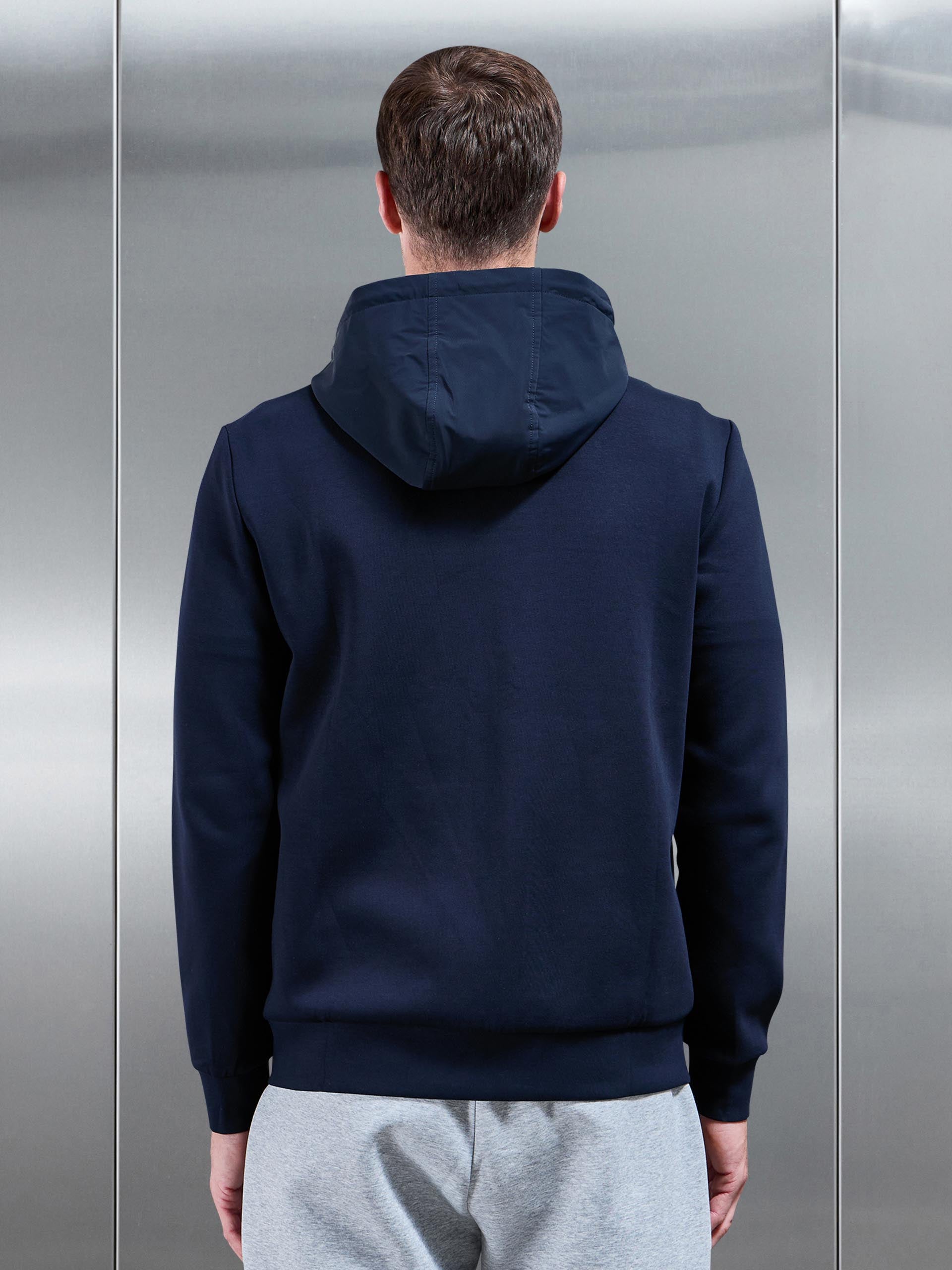 Interlock Jersey Hybrid Technical Windbreaker in Navy