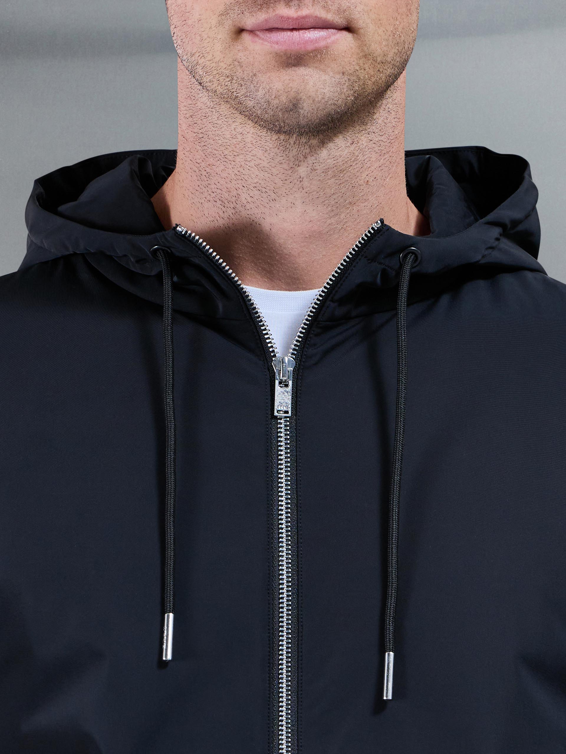 Interlock Jersey Hybrid Windbreaker in Black