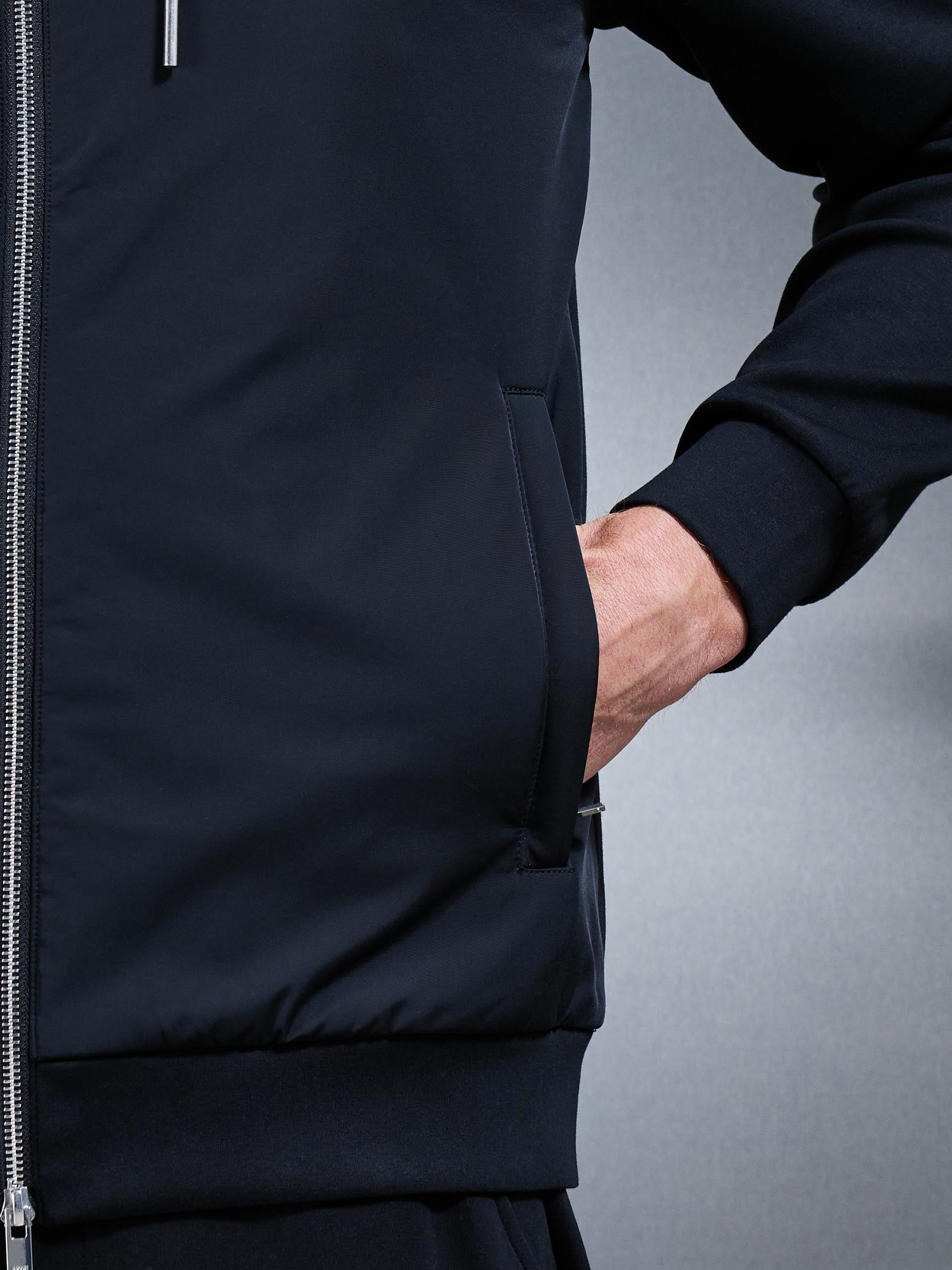 Interlock Jersey Hybrid Windbreaker in Black