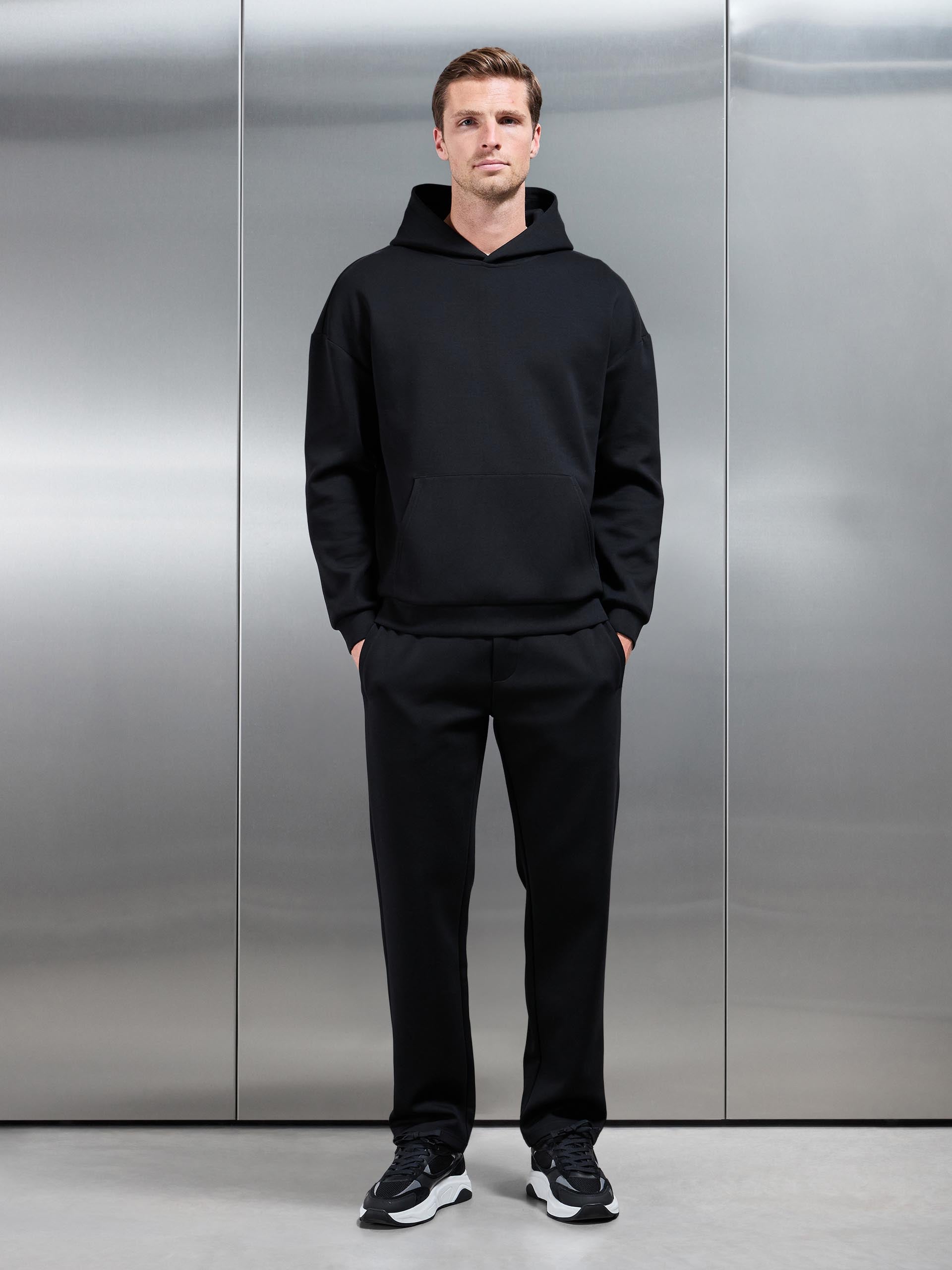 Interlock Jersey Relaxed Fit Hoodie in Black
