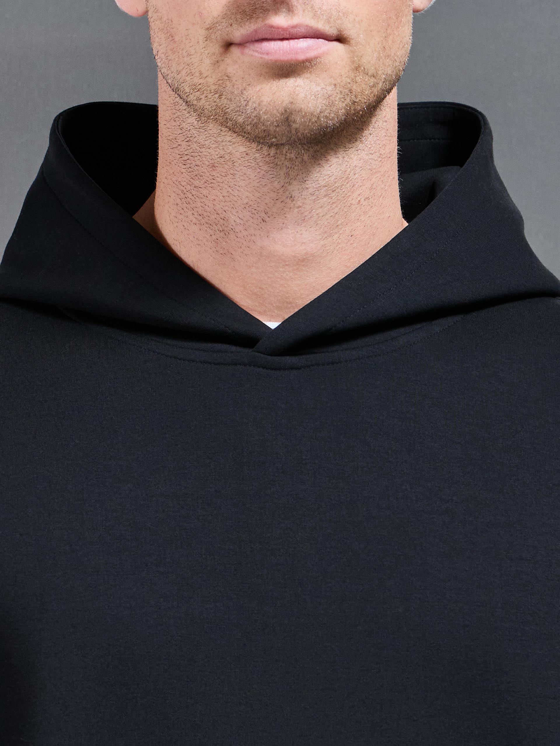 Interlock Jersey Relaxed Fit Hoodie in Black