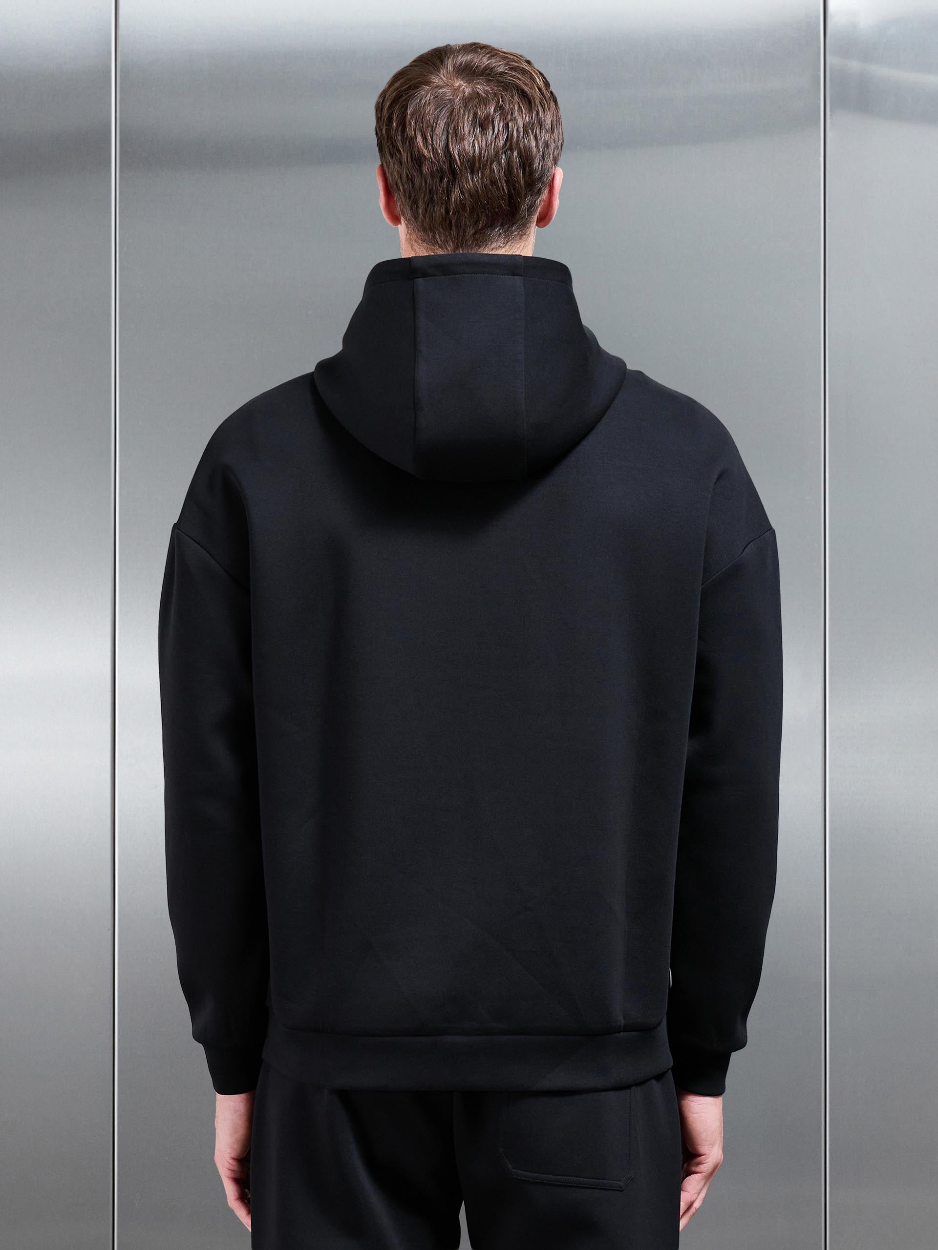 Interlock Jersey Relaxed Fit Hoodie in Black