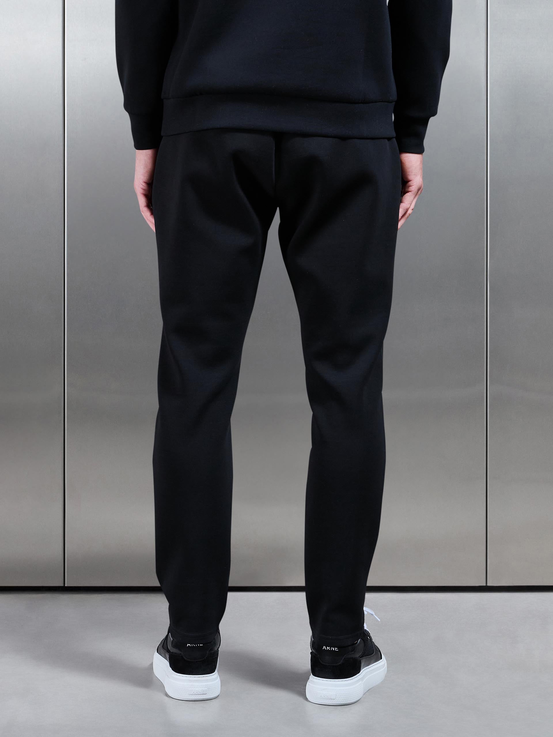 Interlock Jersey Tapered Jogger in Black