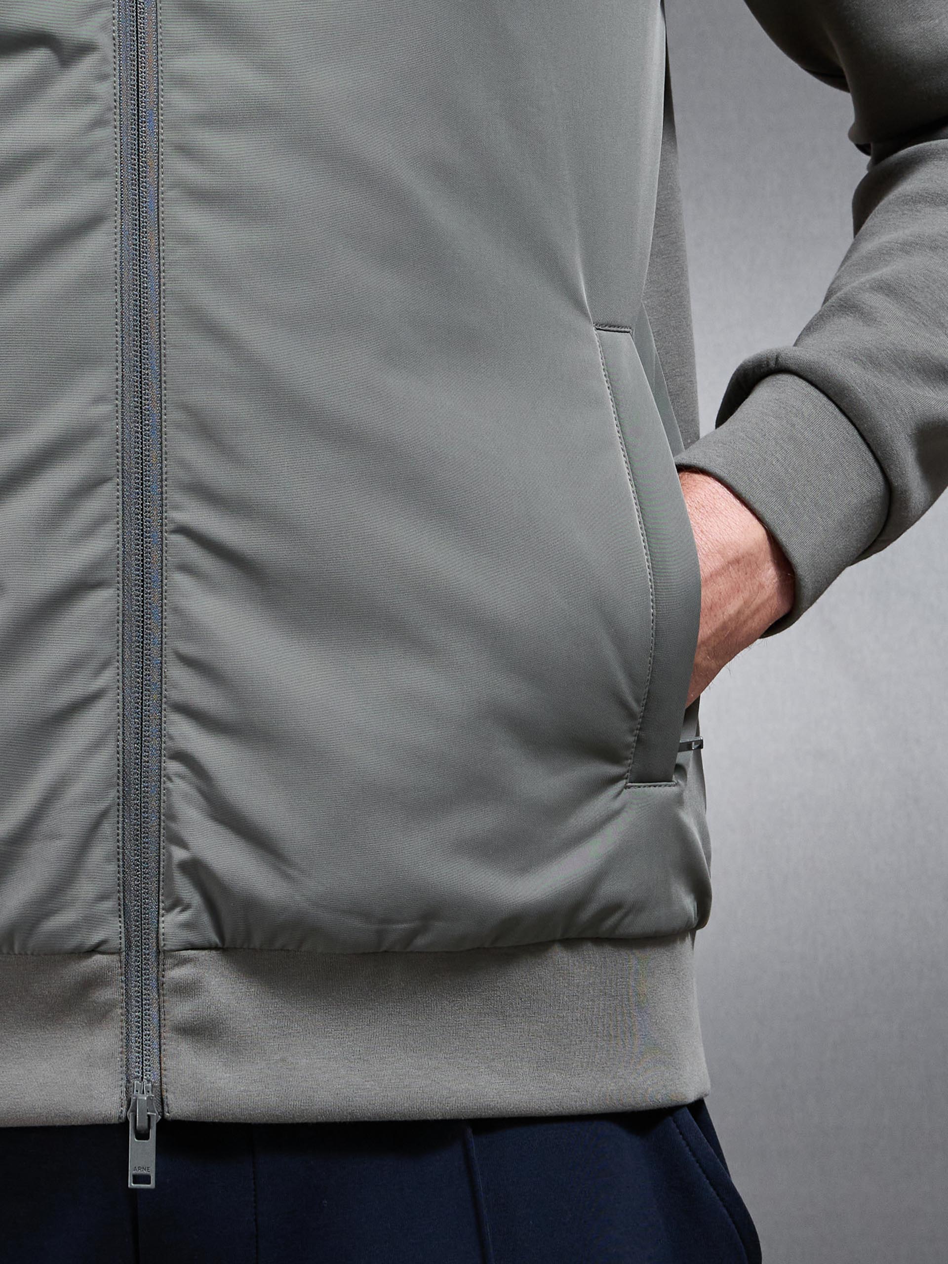 Interlock Jersey Hybrid Technical Windbreaker in Sage