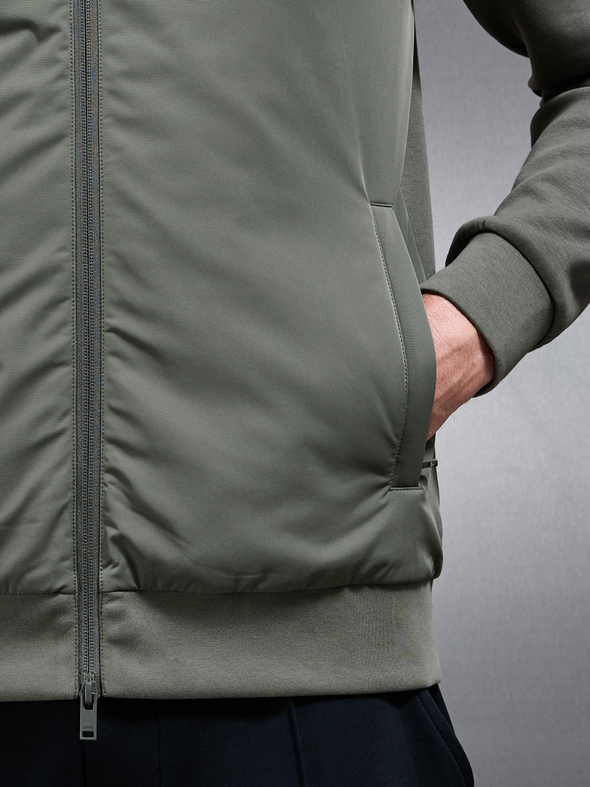 Interlock Jersey Hybrid Technical Windbreaker in Sage