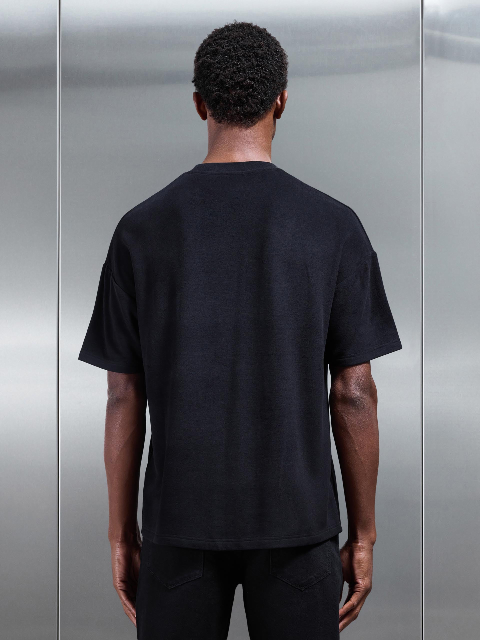 Knitted Textured Relaxed Fit T-Shirt in Black