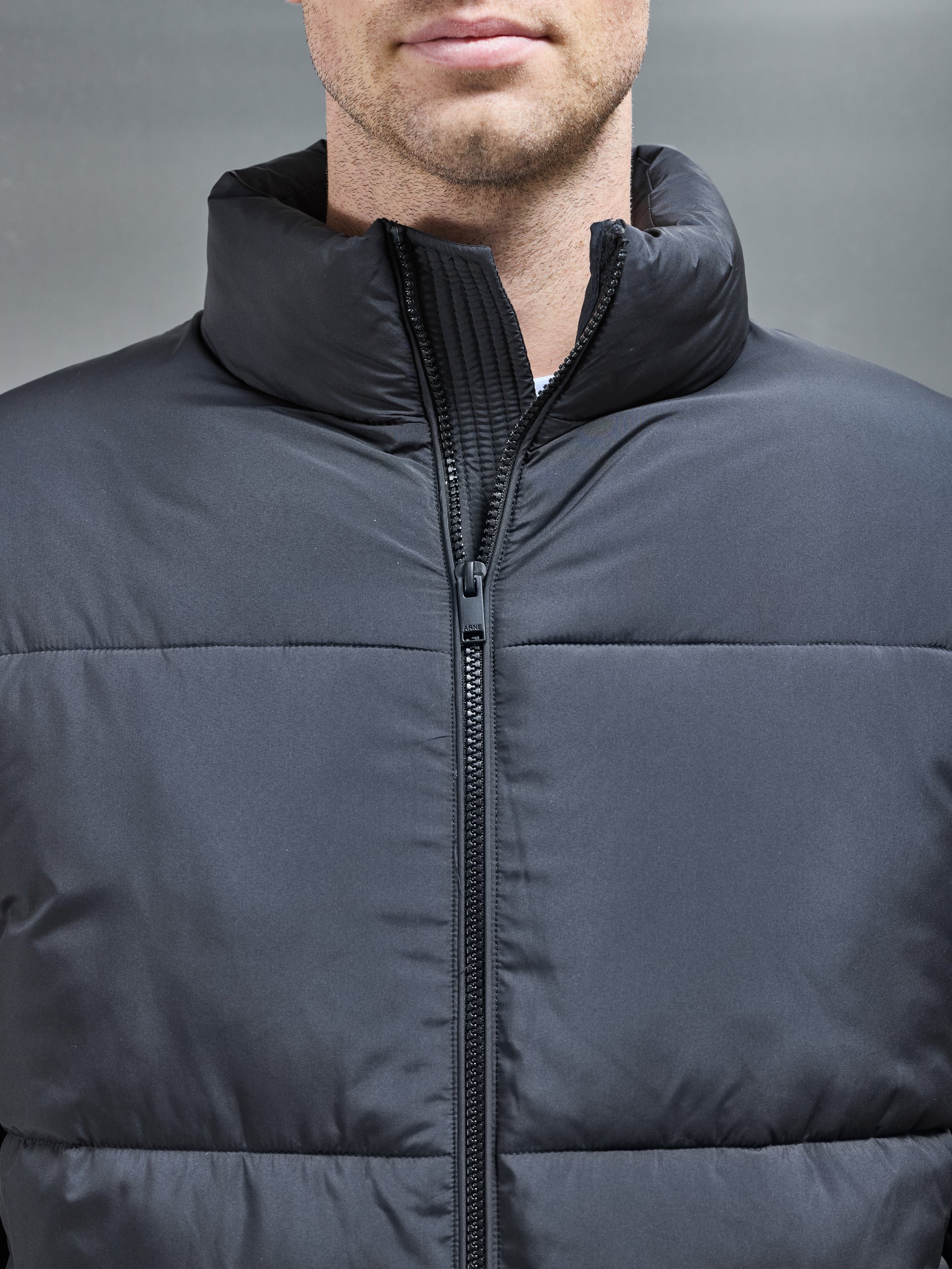 Relaxed Funnel Neck Puffer Jacket in Black
