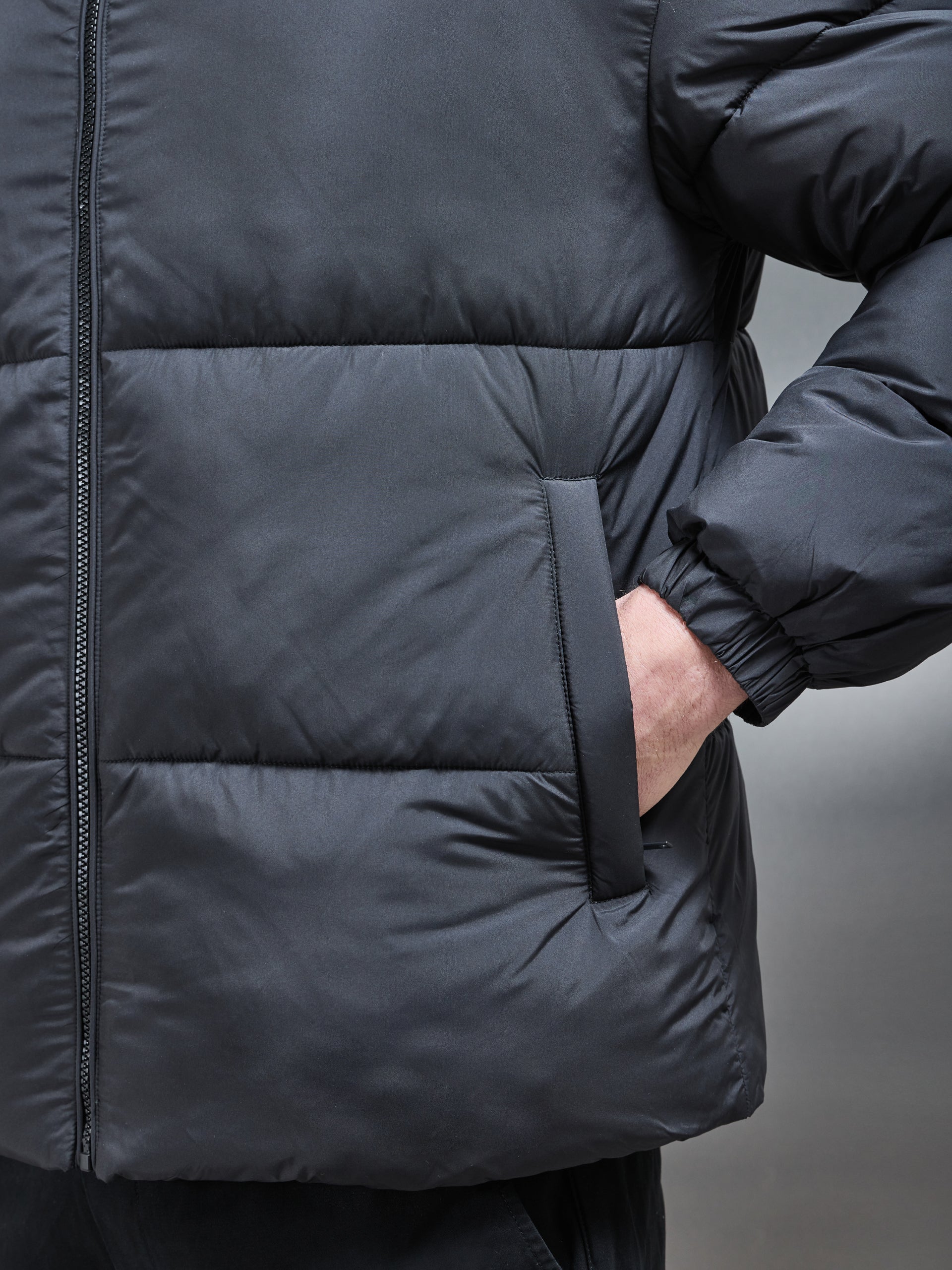 Relaxed Funnel Neck Puffer Jacket in Black
