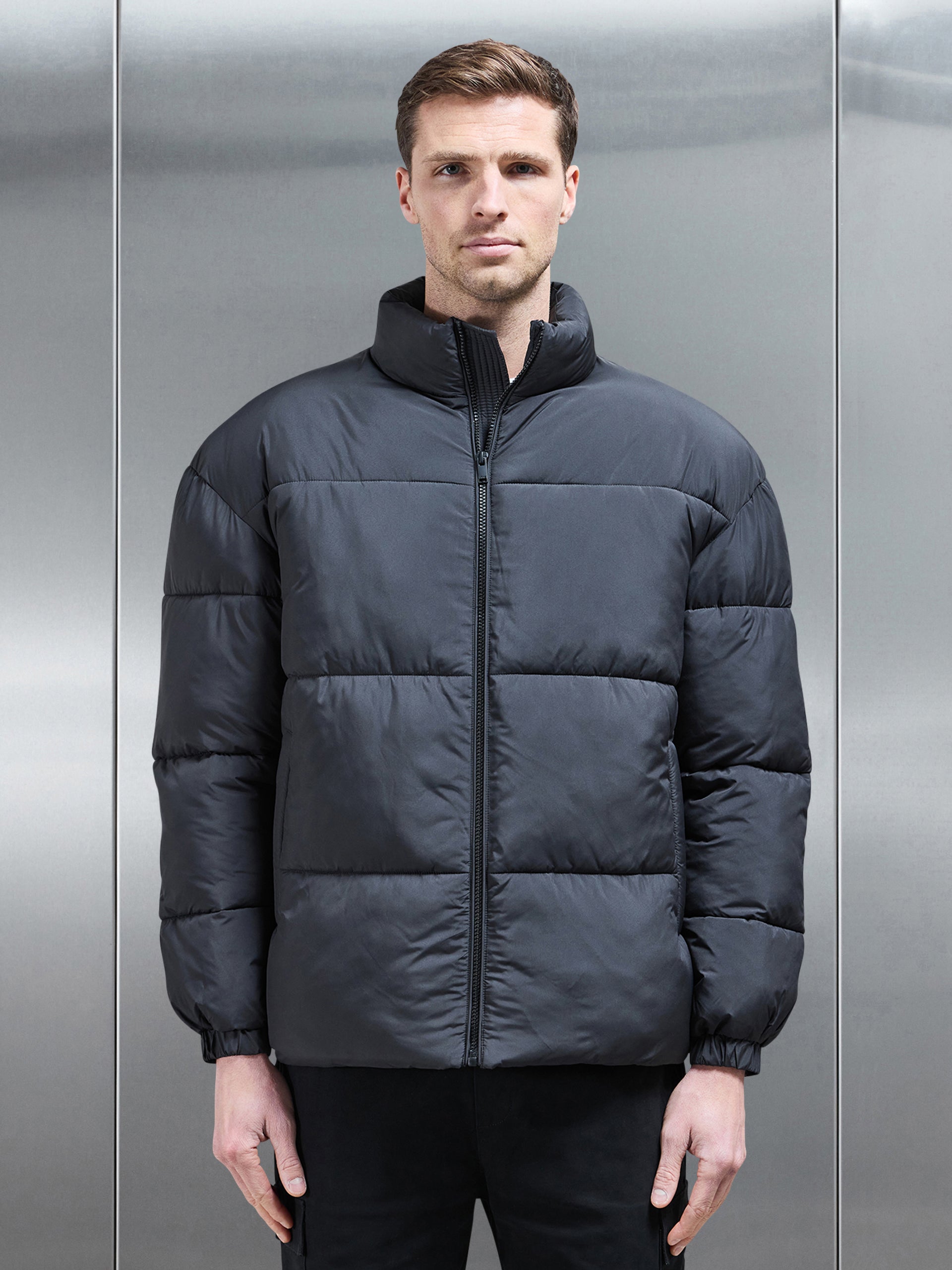 Relaxed Funnel Neck Puffer Jacket in Black