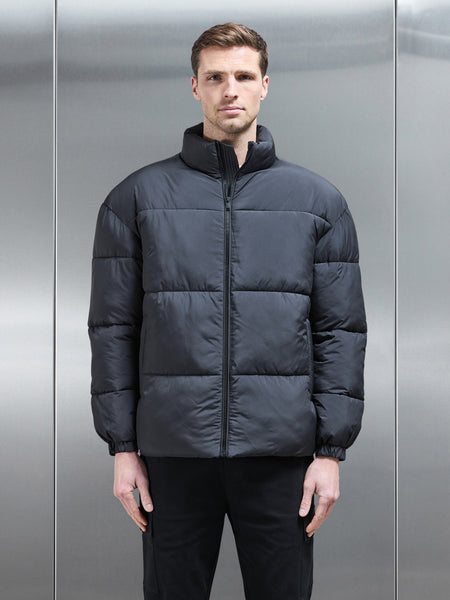 Relaxed Funnel Neck Puffer Jacket in Black