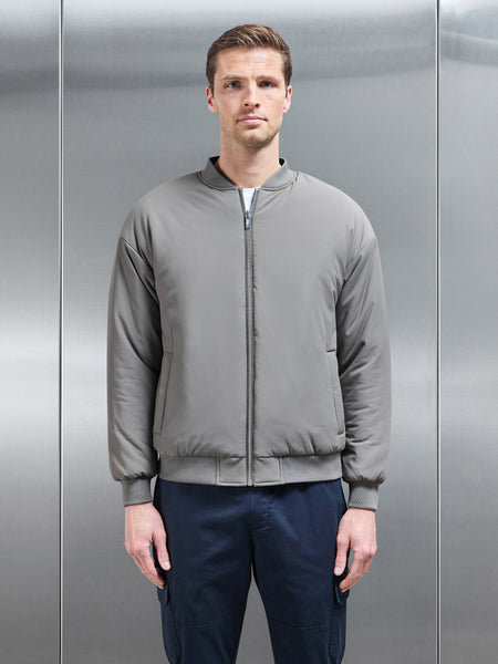 Relaxed Padded Reversible Bomber Jacket in Olive Navy
