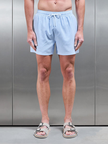 Seersucker Stripe Drawstring Swim Short in Light Blue