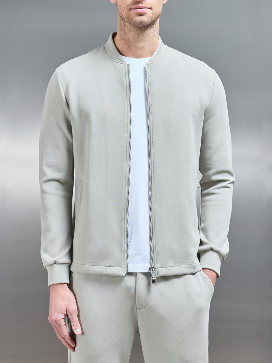 Tailored Interlock Bomber Jacket in Stone