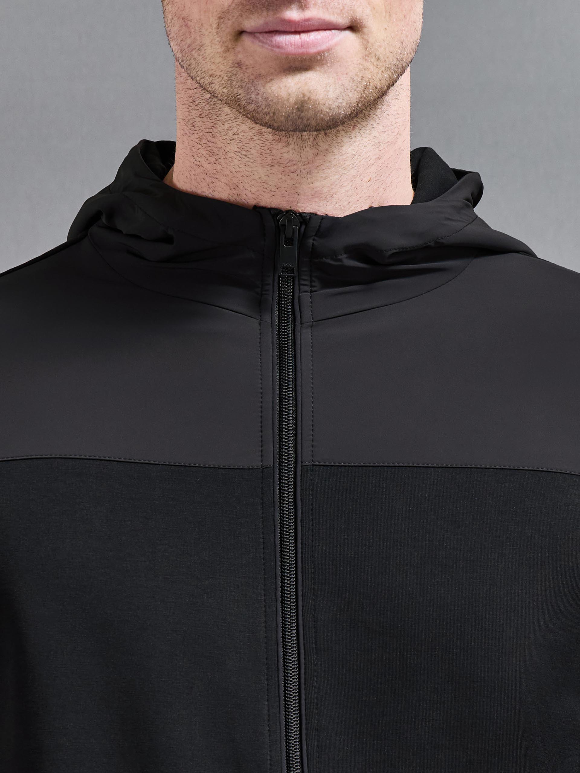 Apex Hybrid Jersey Windbreaker in Black
