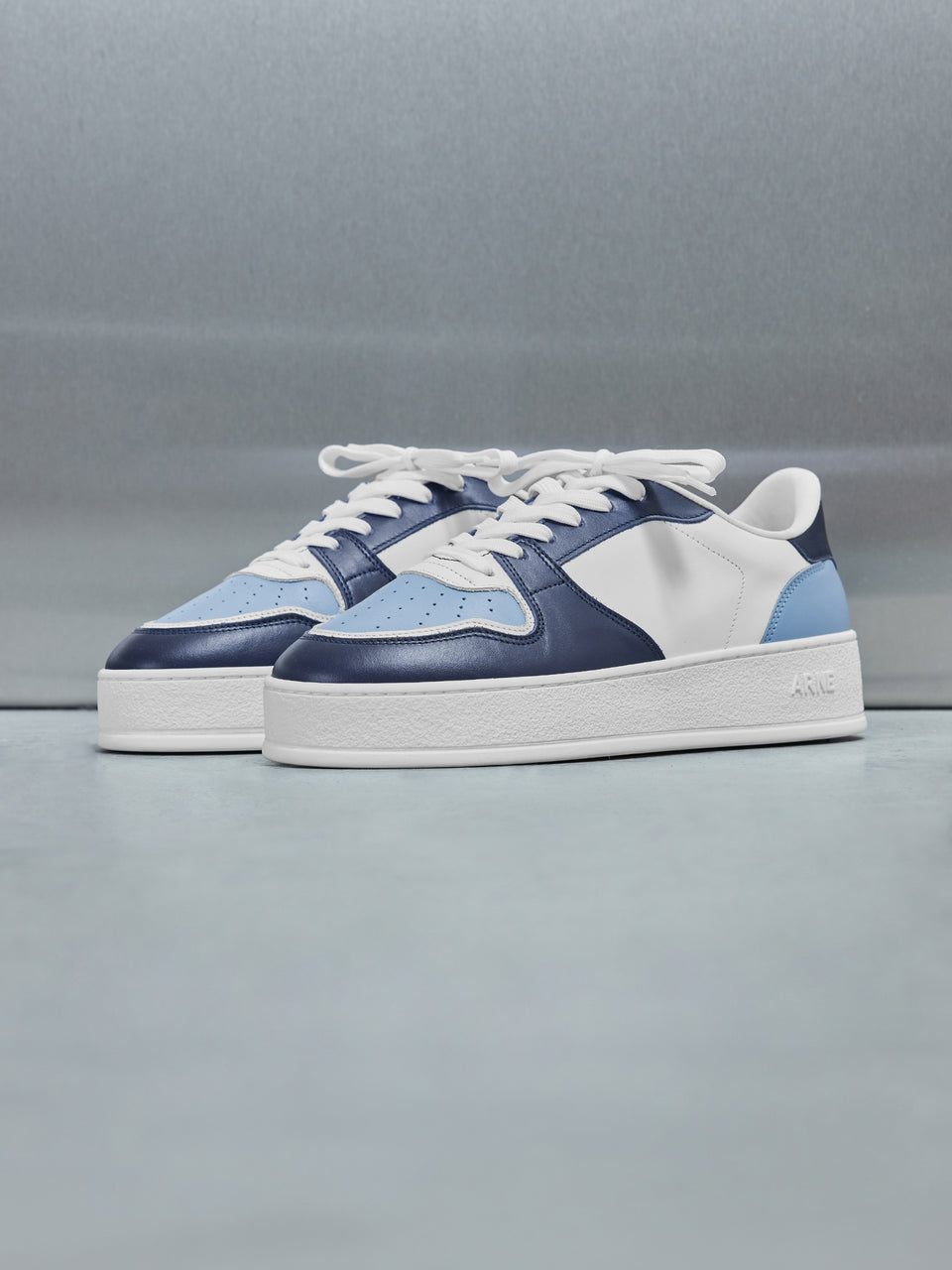 Arena Trainer in White Light Blue Navy
