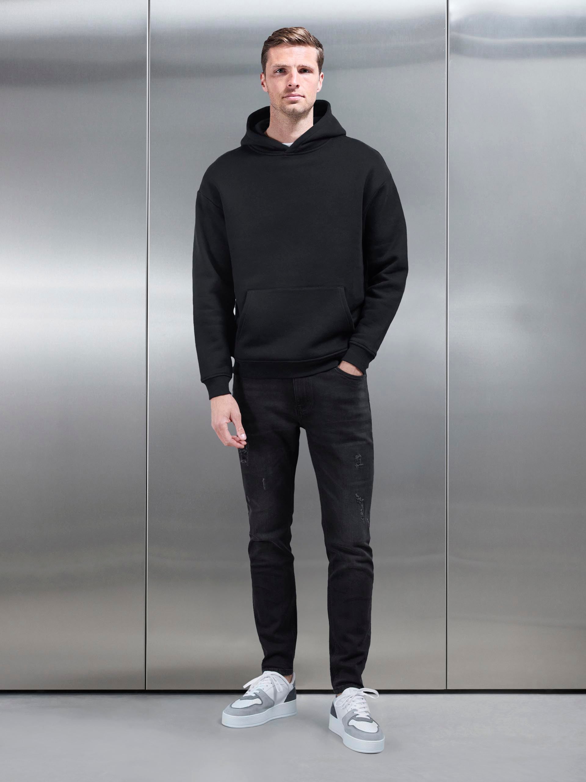 Distressed Denim Jeans in Black Wash