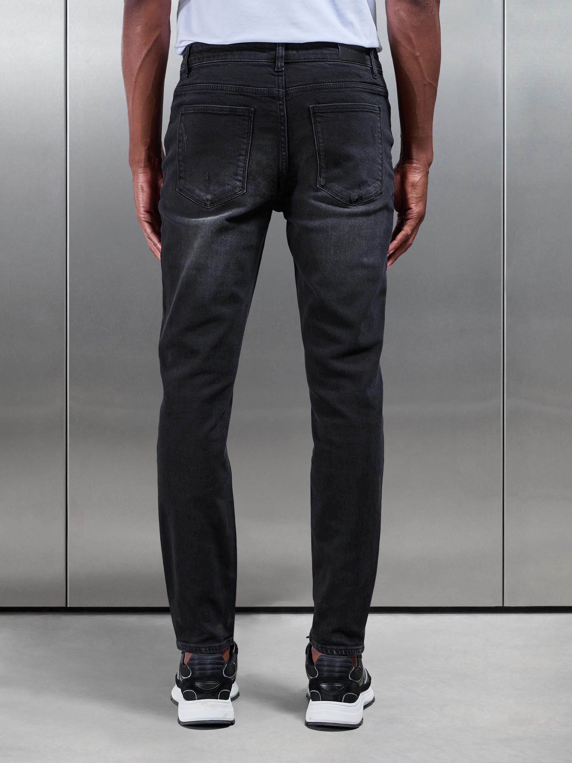 Distressed Denim Jeans in Black Wash