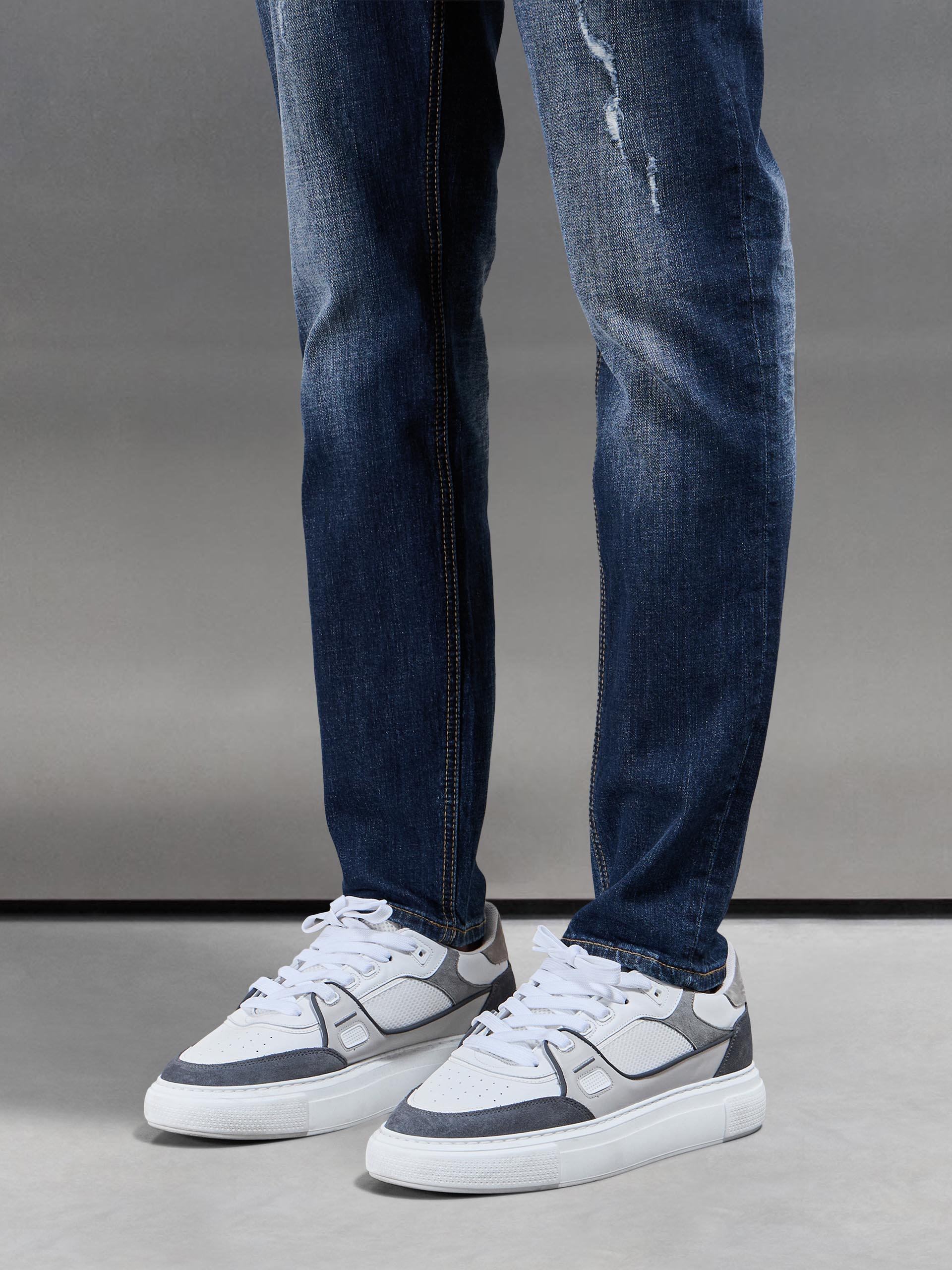 Distressed Denim Jeans in Dark Wash