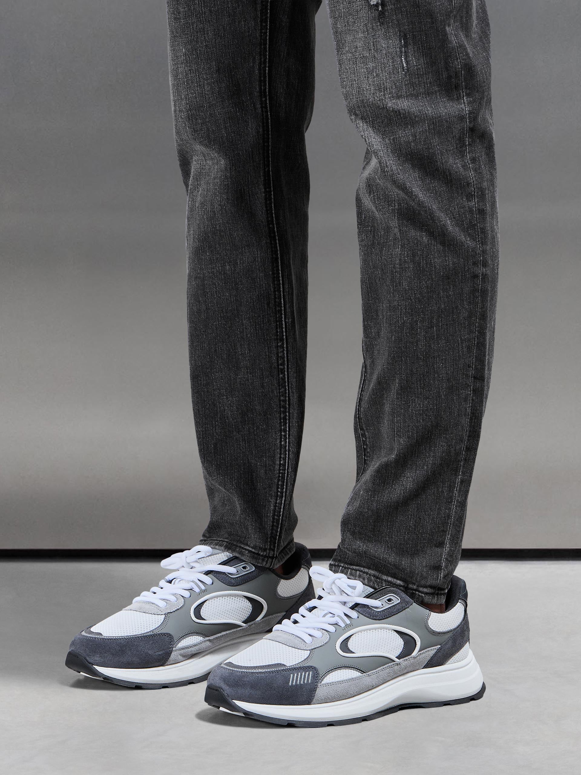 Distressed Denim Jeans in Grey Wash