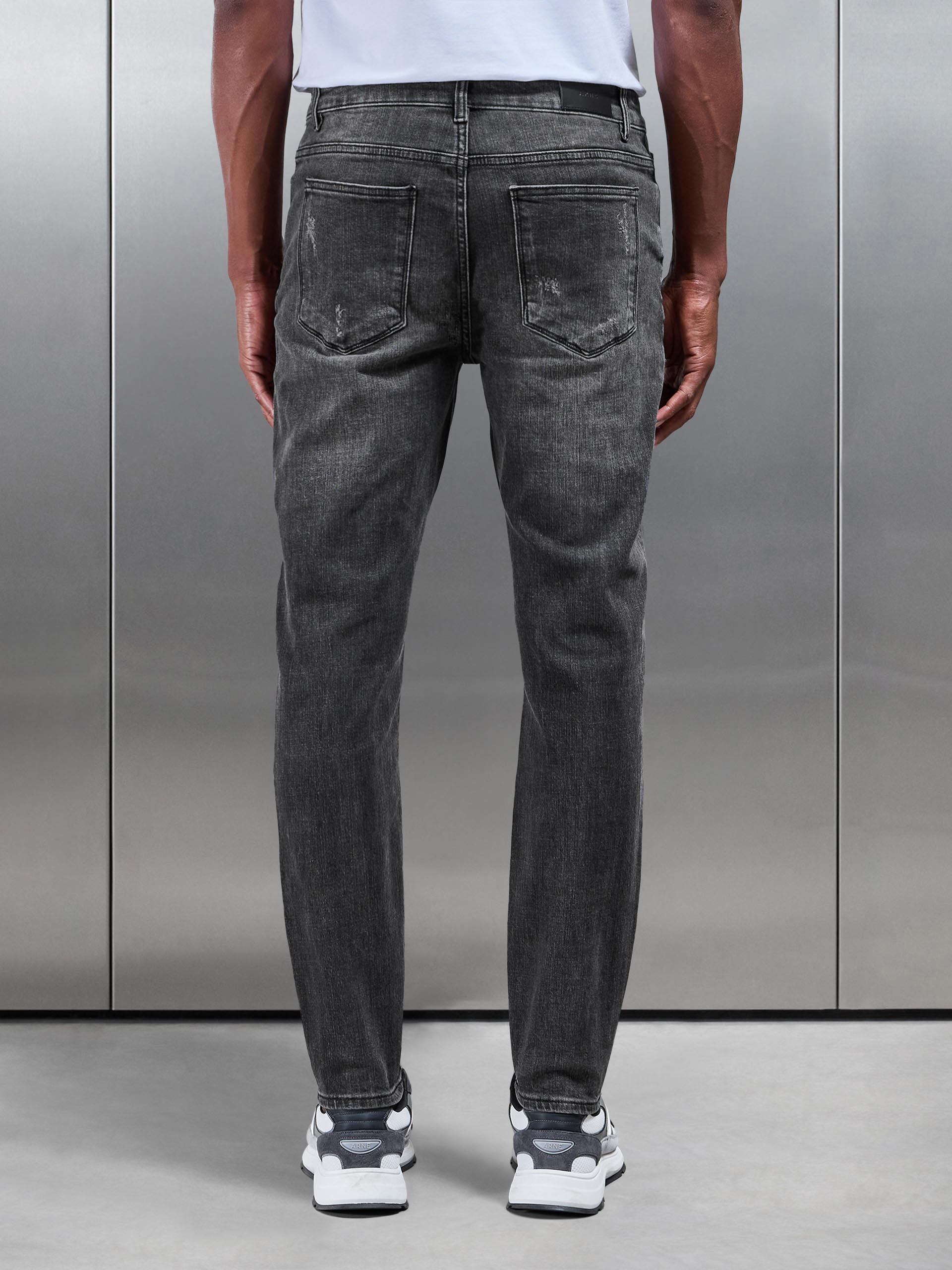 Distressed Denim Jeans in Grey Wash