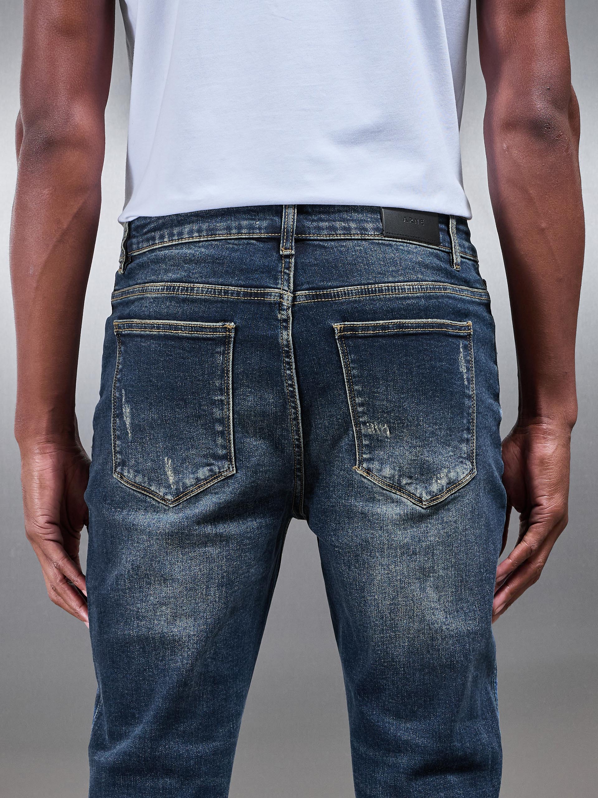 Distressed Denim Jeans in Vintage Blue