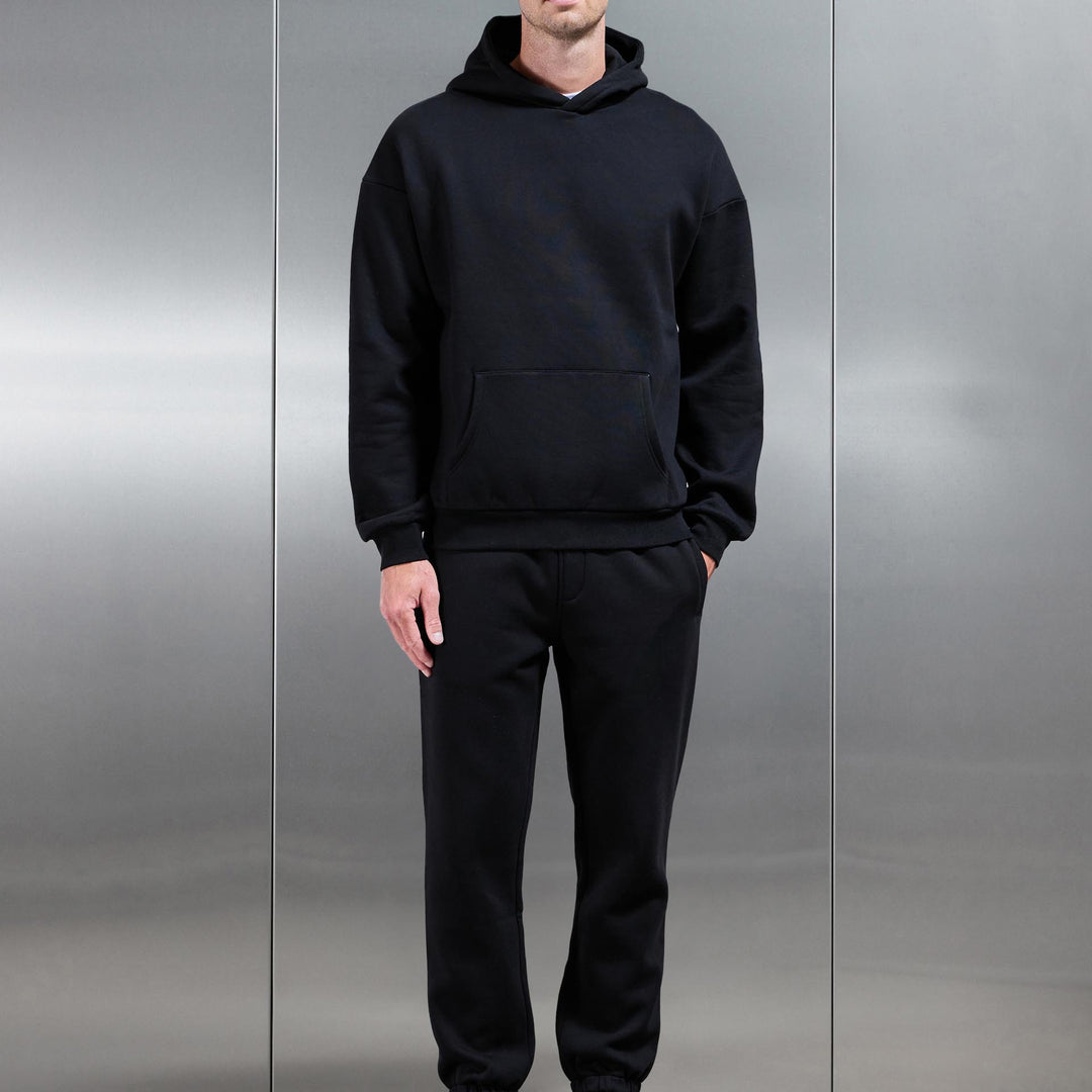Essential Relaxed Hoodie in Black