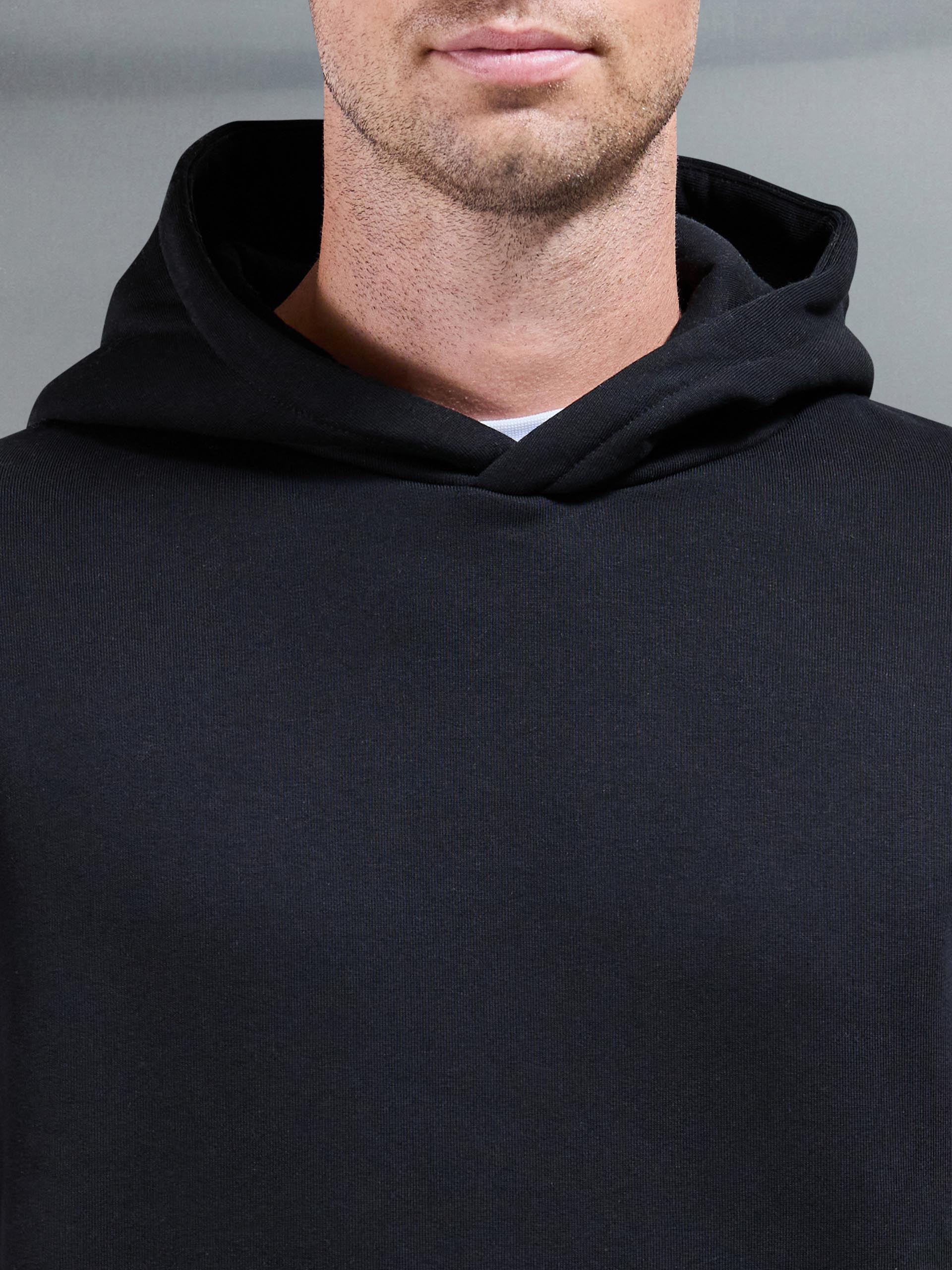 Essential Relaxed Hoodie in Black