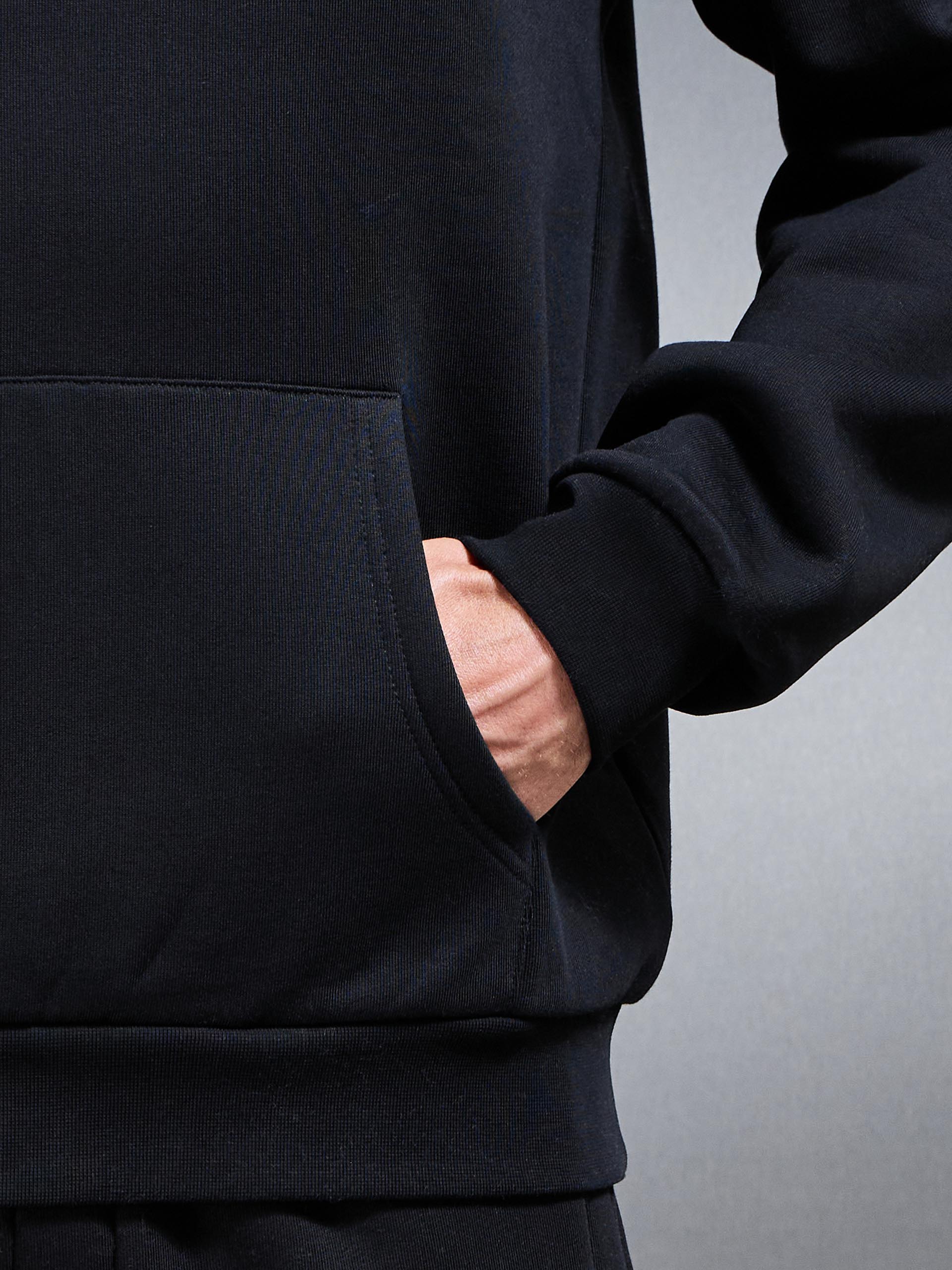 Essential Relaxed Hoodie in Black