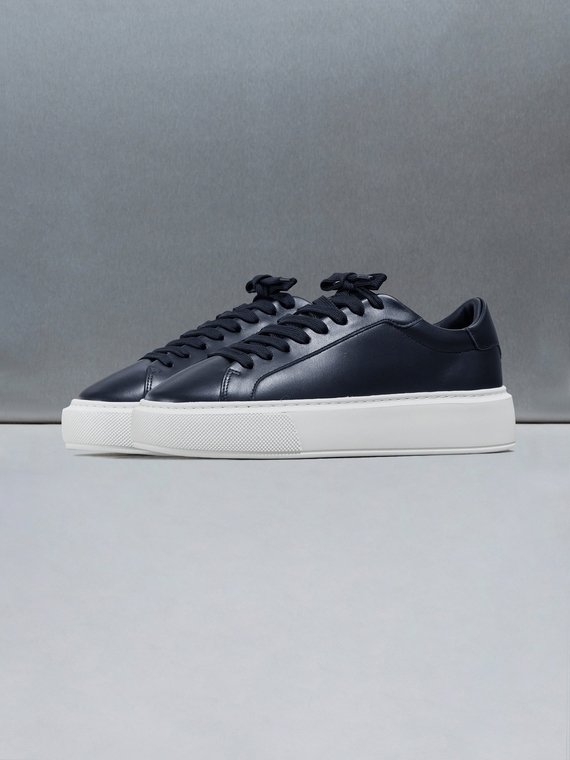 Essential Leather Trainer in Navy