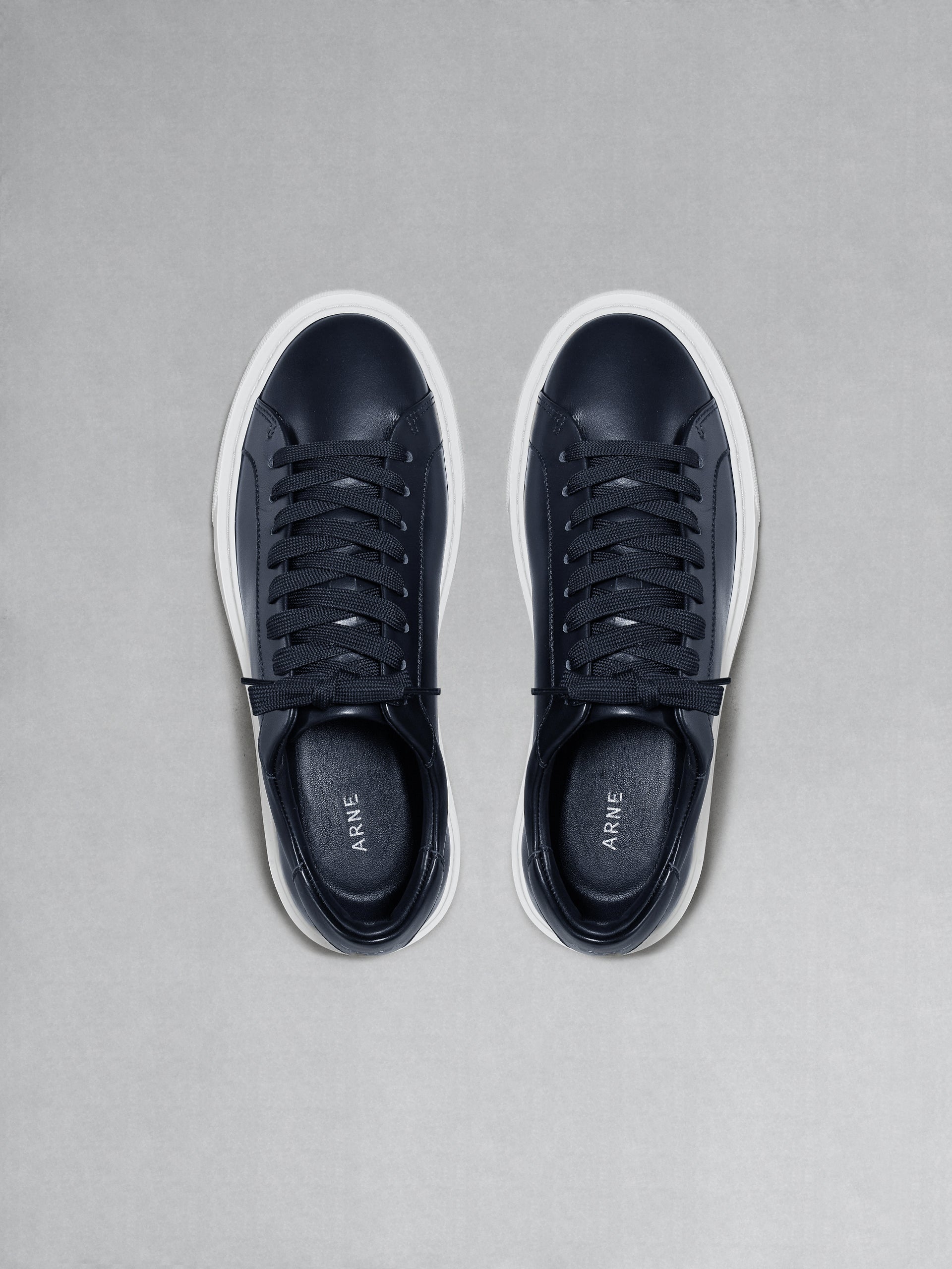 Essential Leather Trainer in Navy