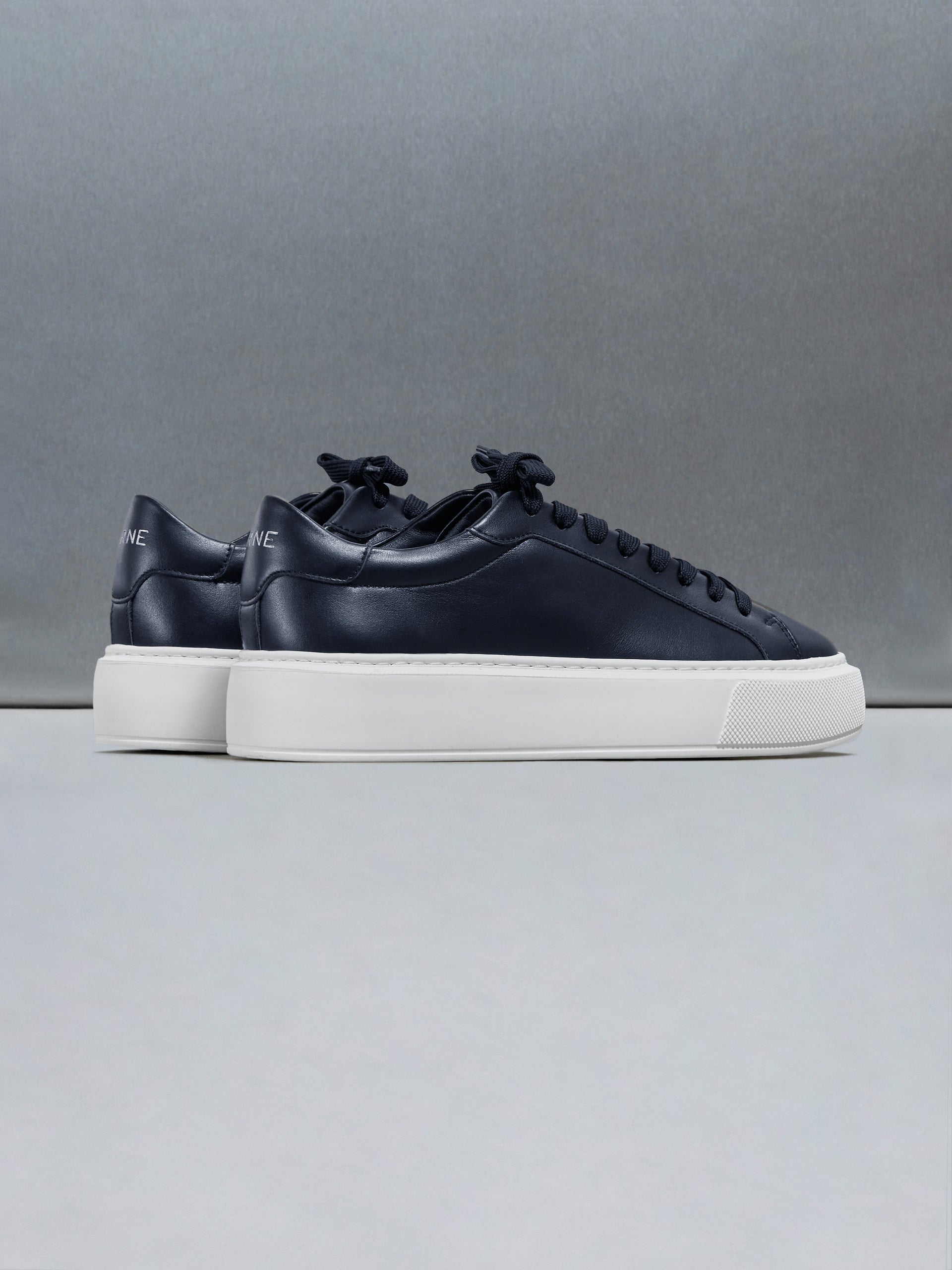 Essential Leather Trainer in Navy