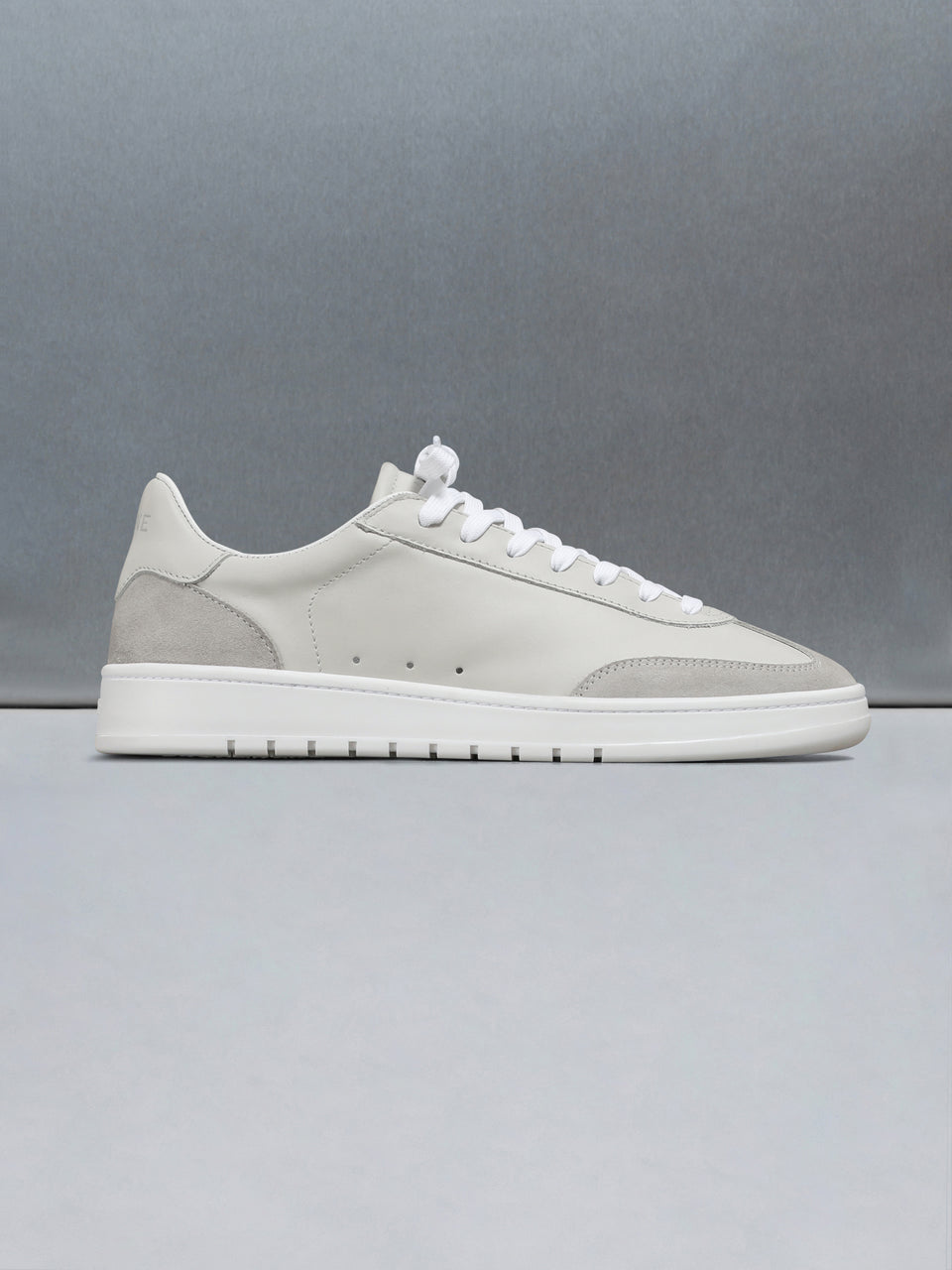 Tennis Trainer in Stone