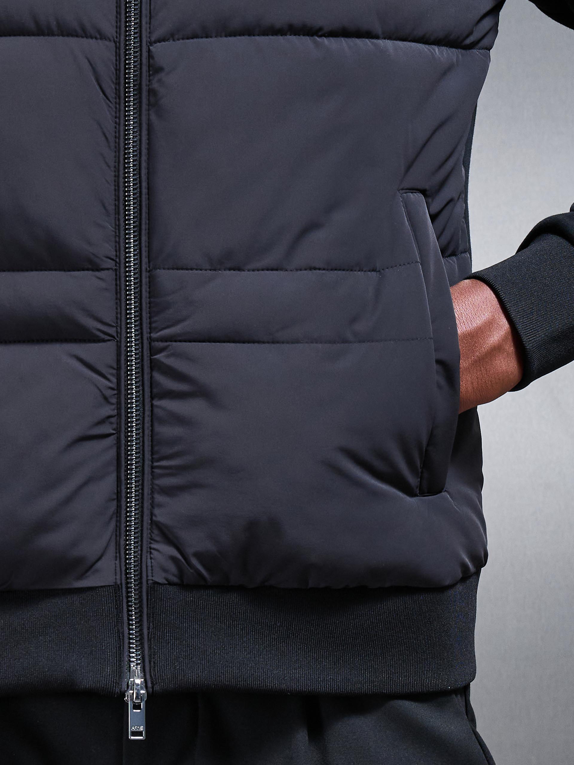 Hybrid Panel Puffer Jacket in Black