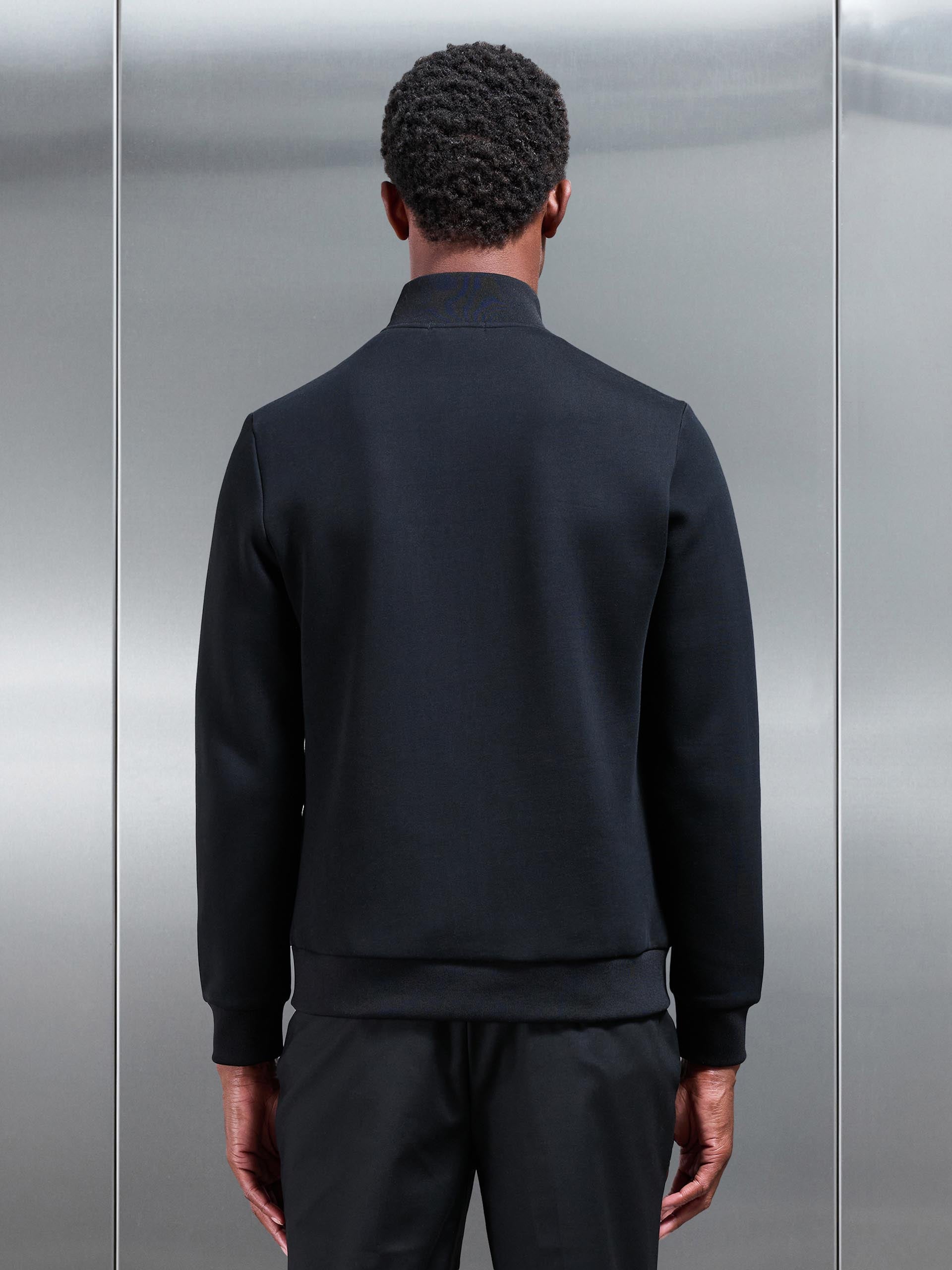 Hybrid Panel Puffer Jacket in Black