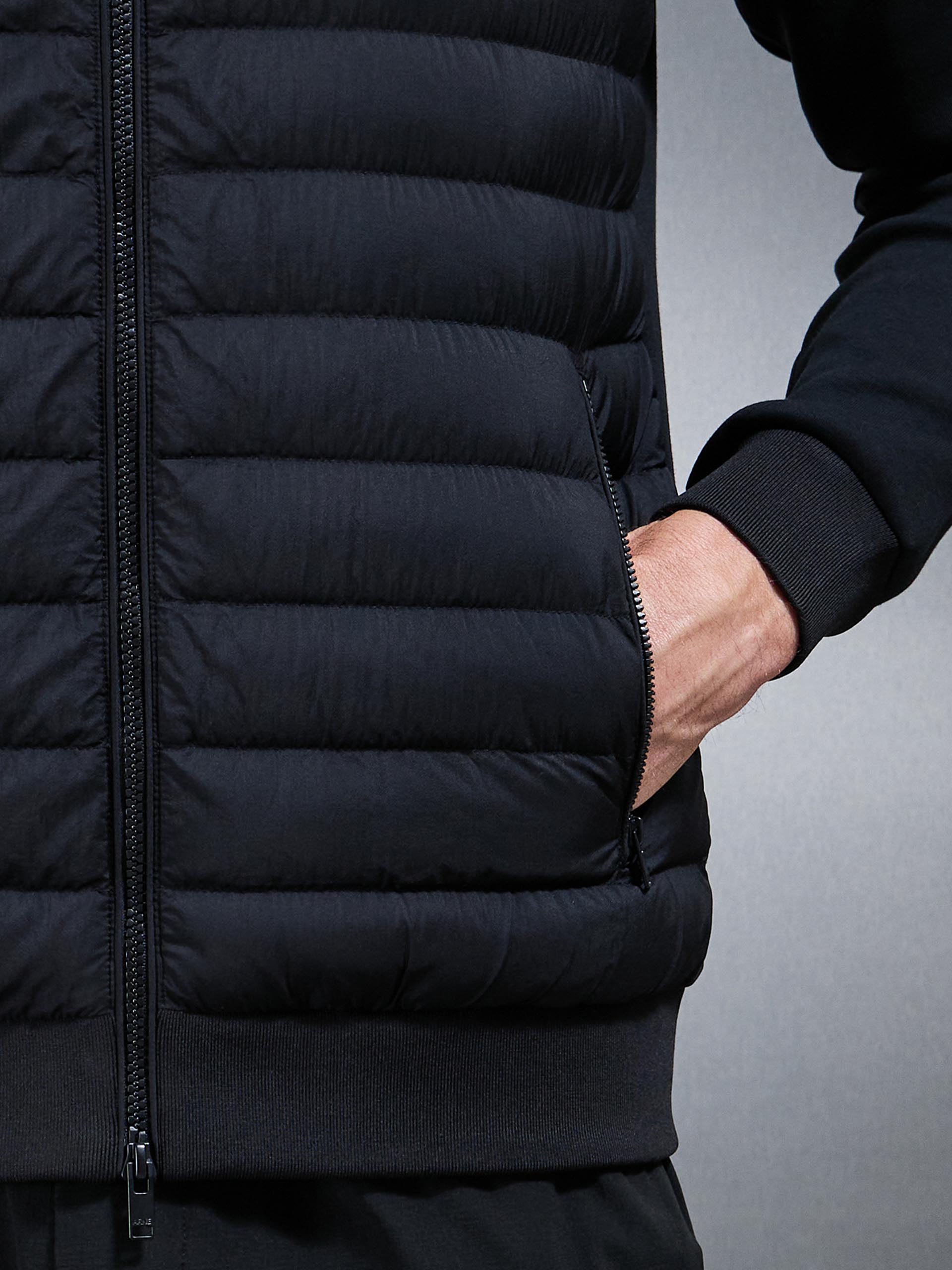 Hybrid Quilted Technical Funnel Neck Jacket in Black