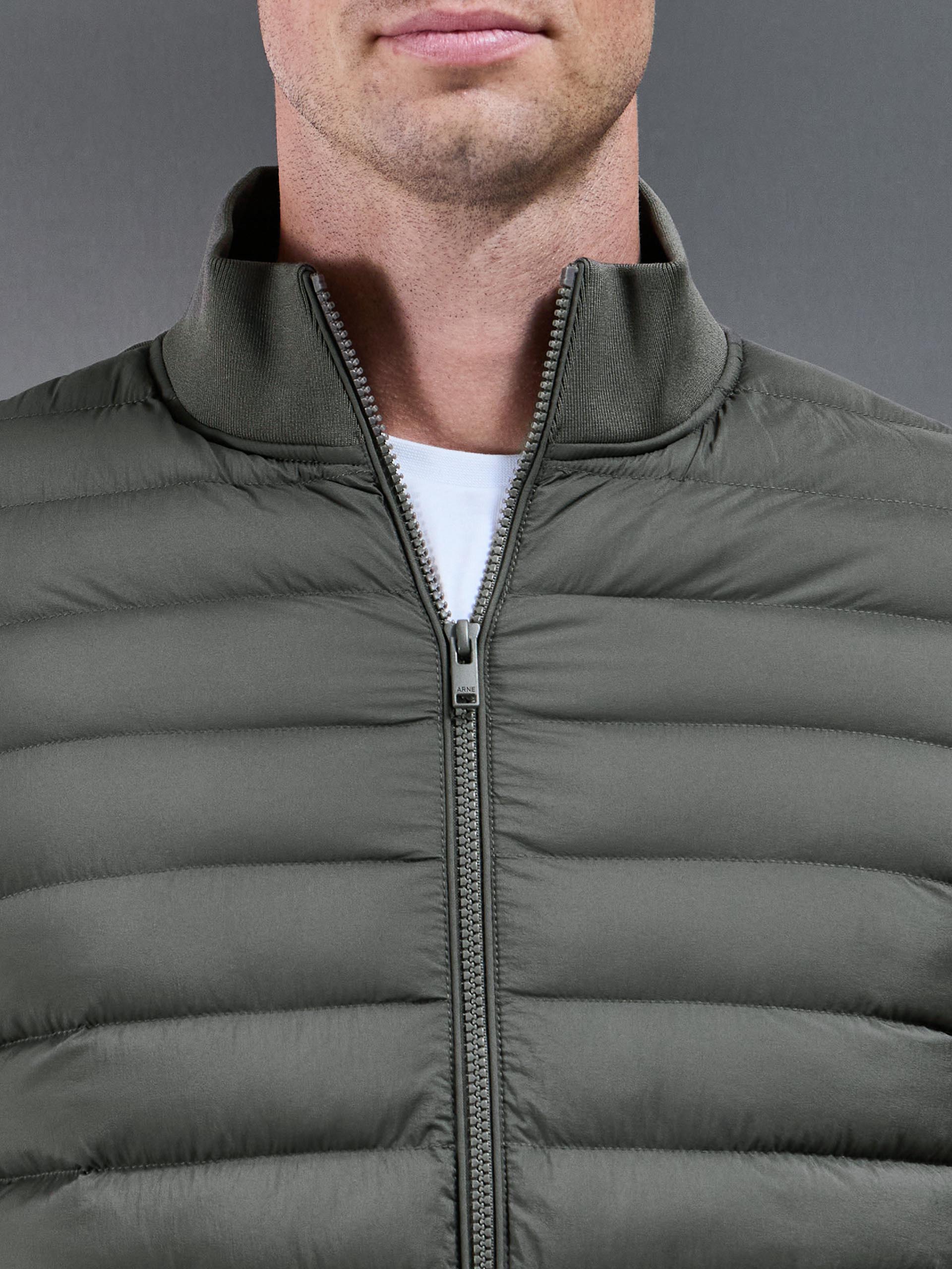 Hybrid Quilted Technical Funnel Neck Jacket in Olive