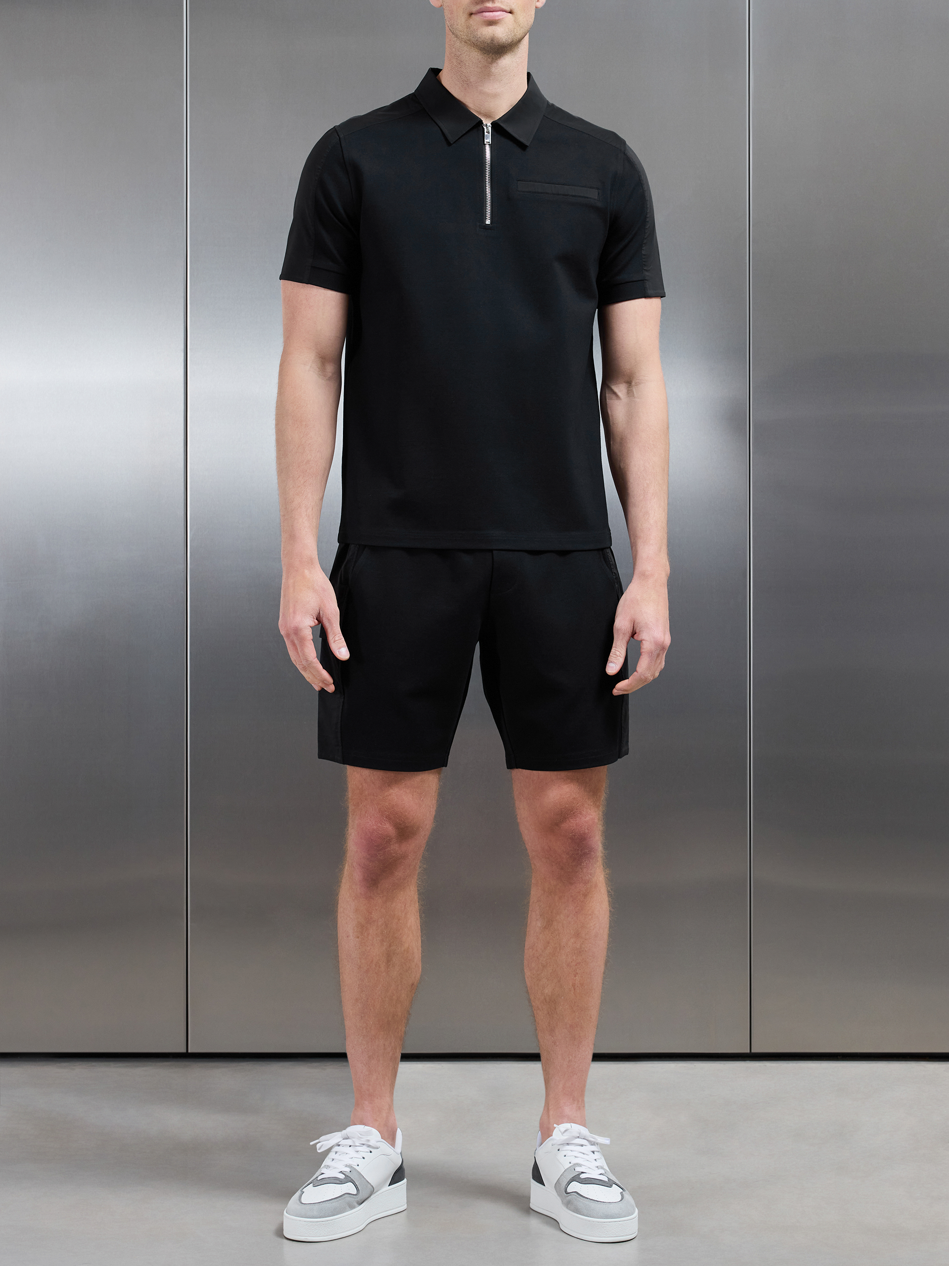 Hybrid Cargo Zip Polo Shirt in Black