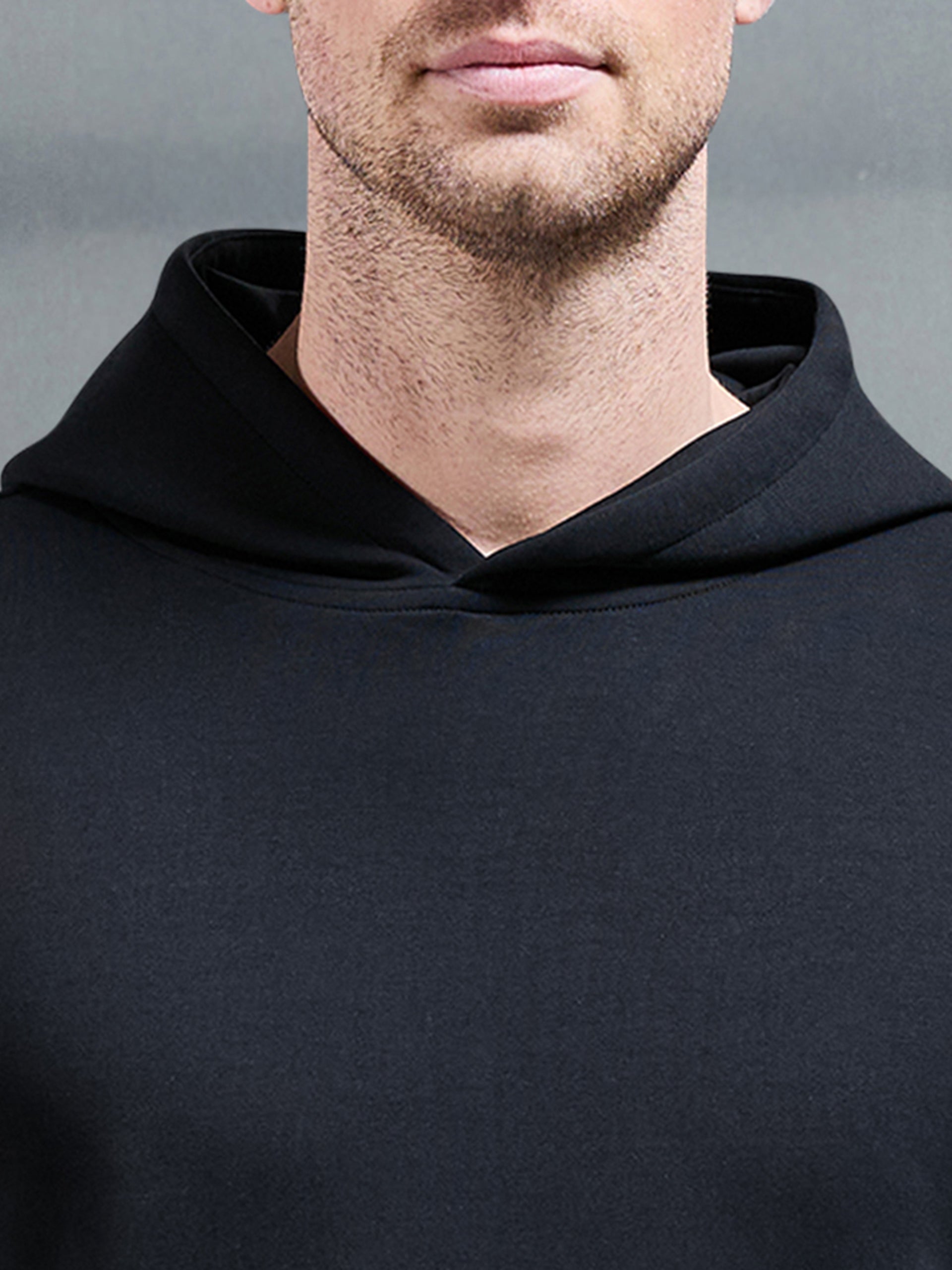 Interlock Jersey Essential Hoodie in Black